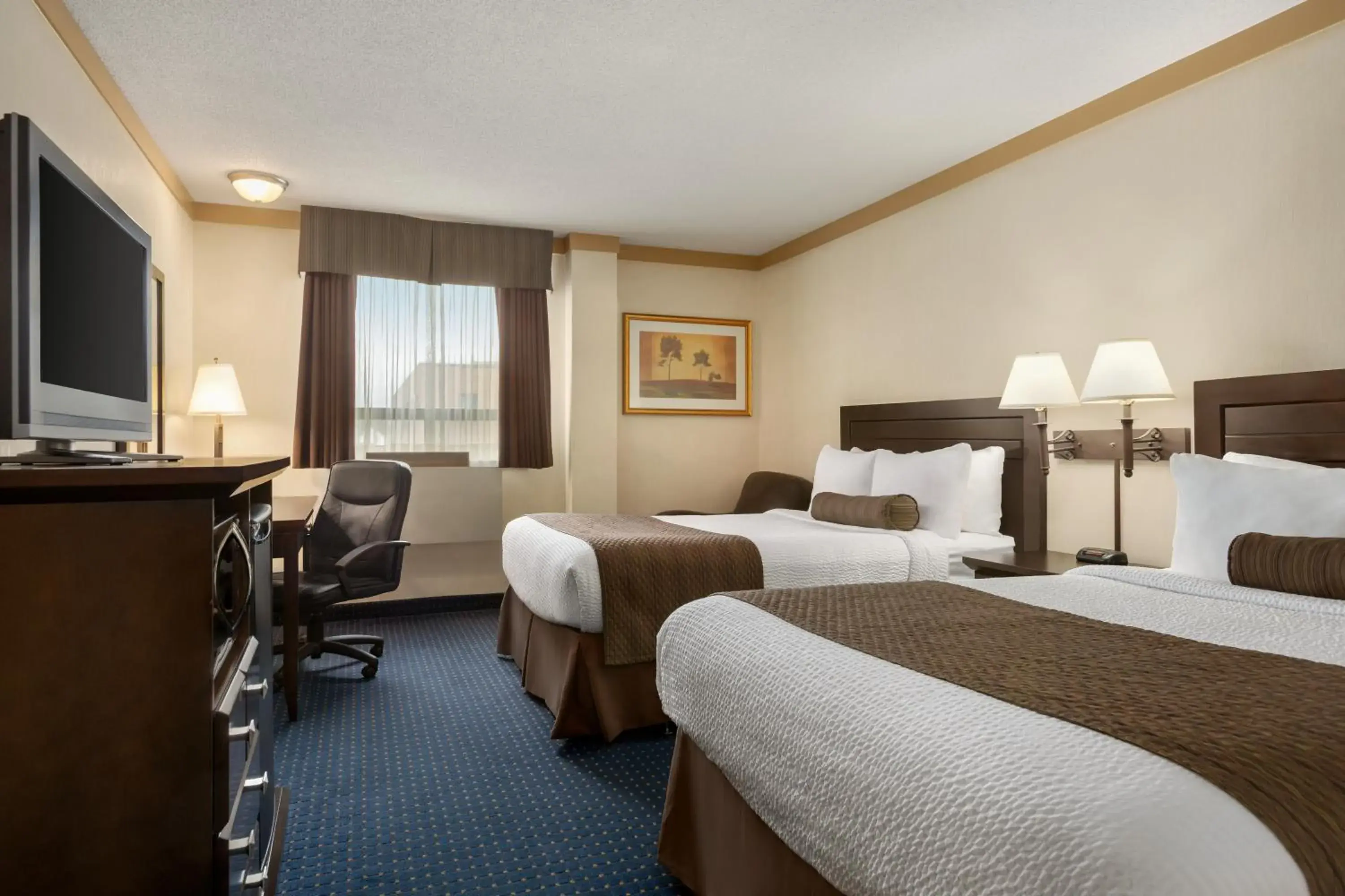 Photo of the whole room, Bed in Days Inn & Suites by Wyndham Sault Ste. Marie ON Photo of the whole room, Bed in Days Inn & Suites by Wyndham Sault Ste. Marie ON