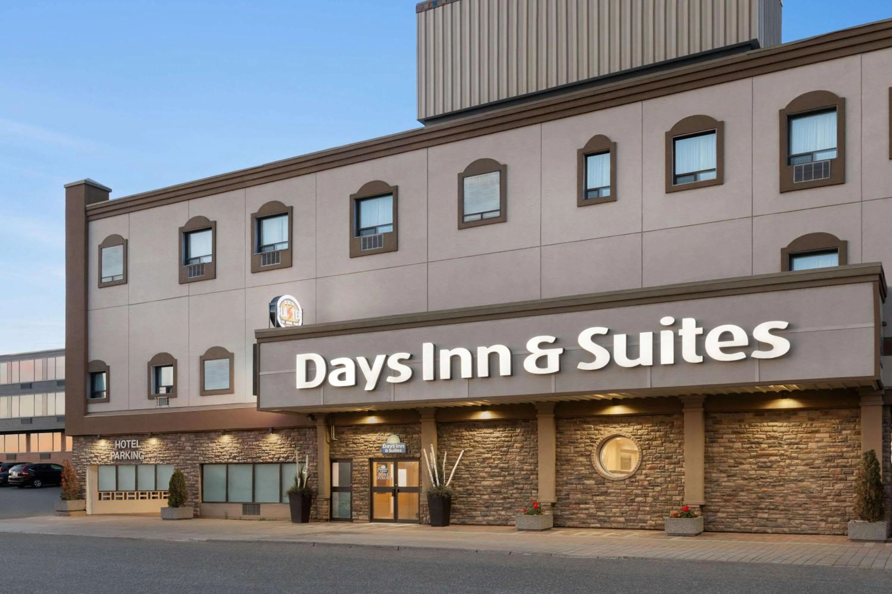 Property building in Days Inn & Suites by Wyndham Sault Ste. Marie ON