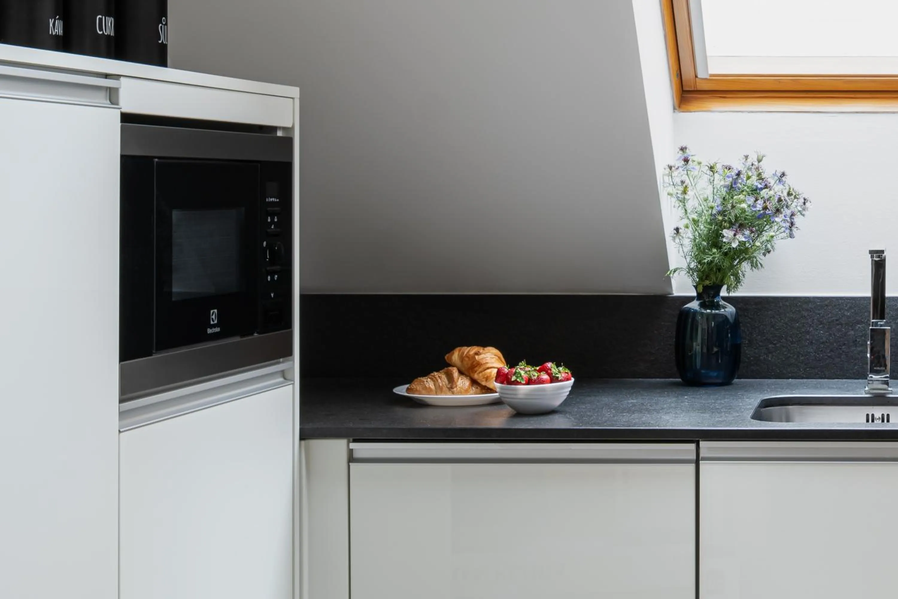 Kitchen or kitchenette in Coco Chanel Boutique Apartment by Goodnite cz