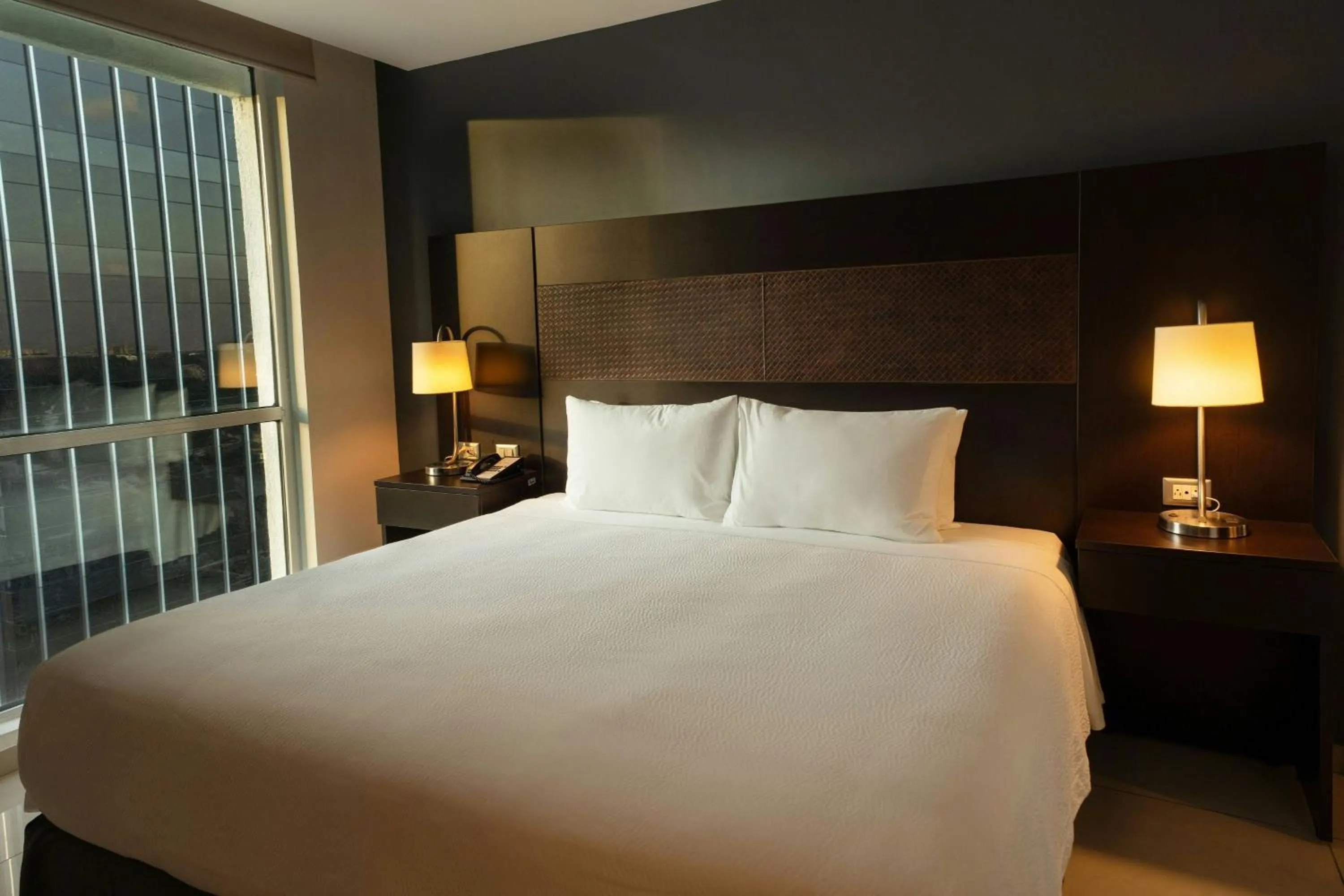 Photo of the whole room, Bed in Courtyard by Marriott Guadalajara Andares