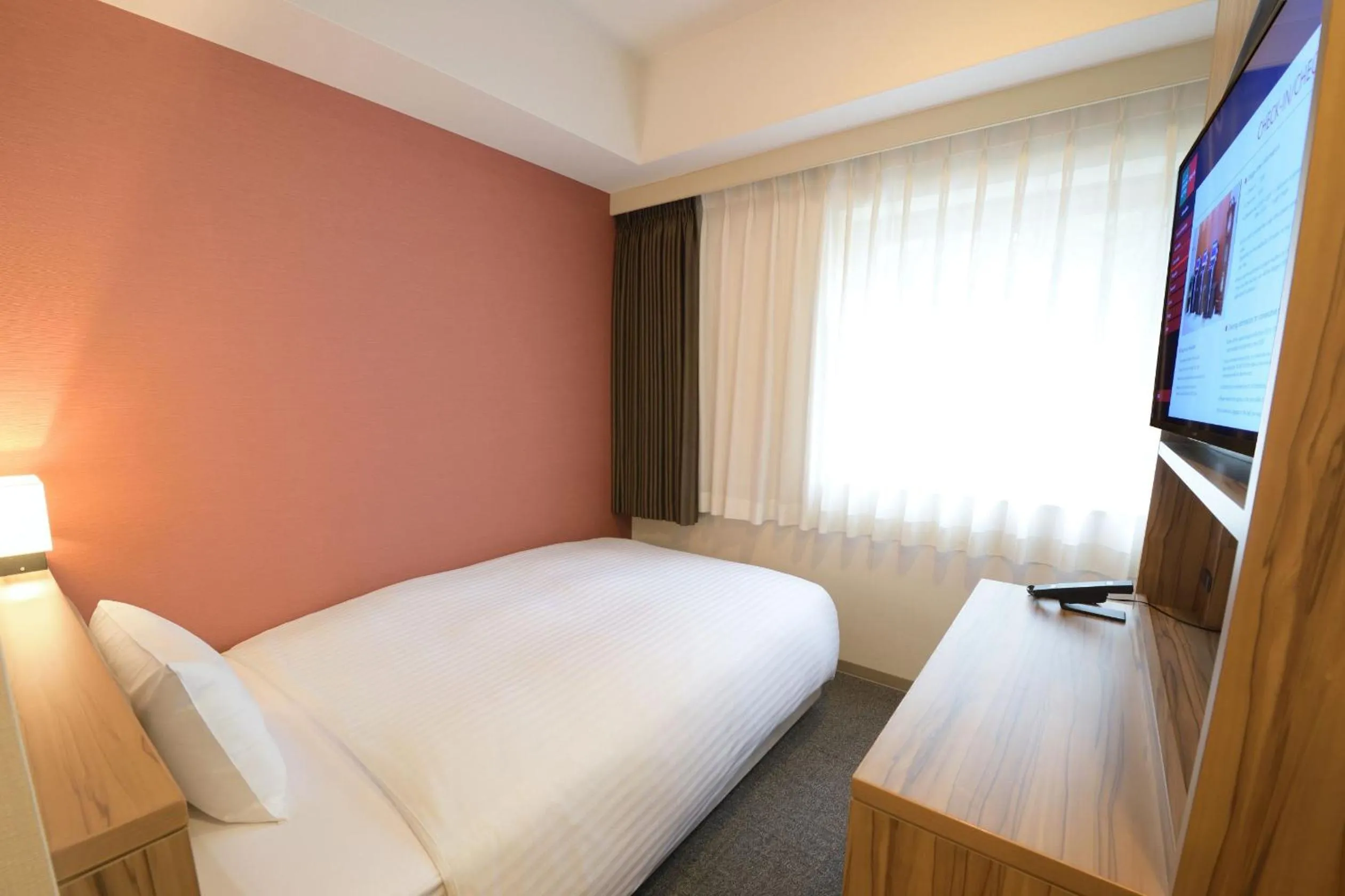 Photo of the whole room, Bed in Hakata Green Hotel Tenjin