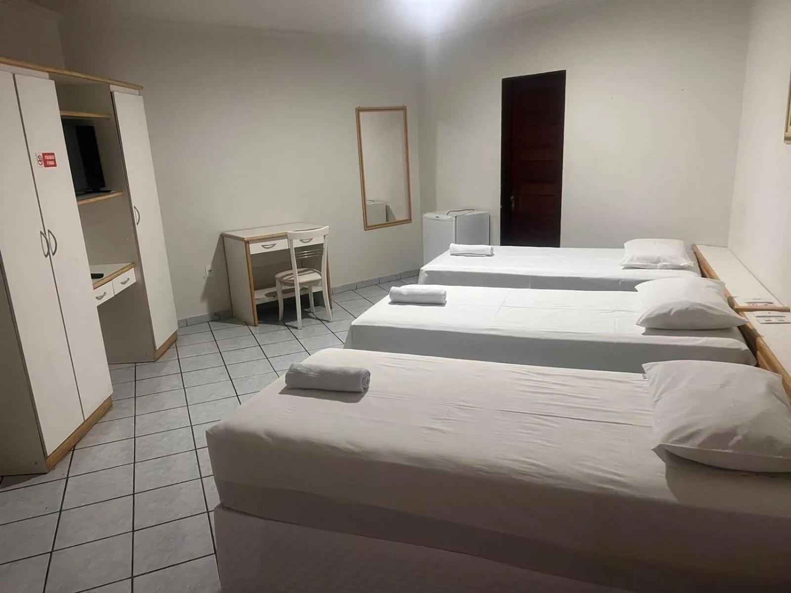 Bed in Center Plaza Hotel