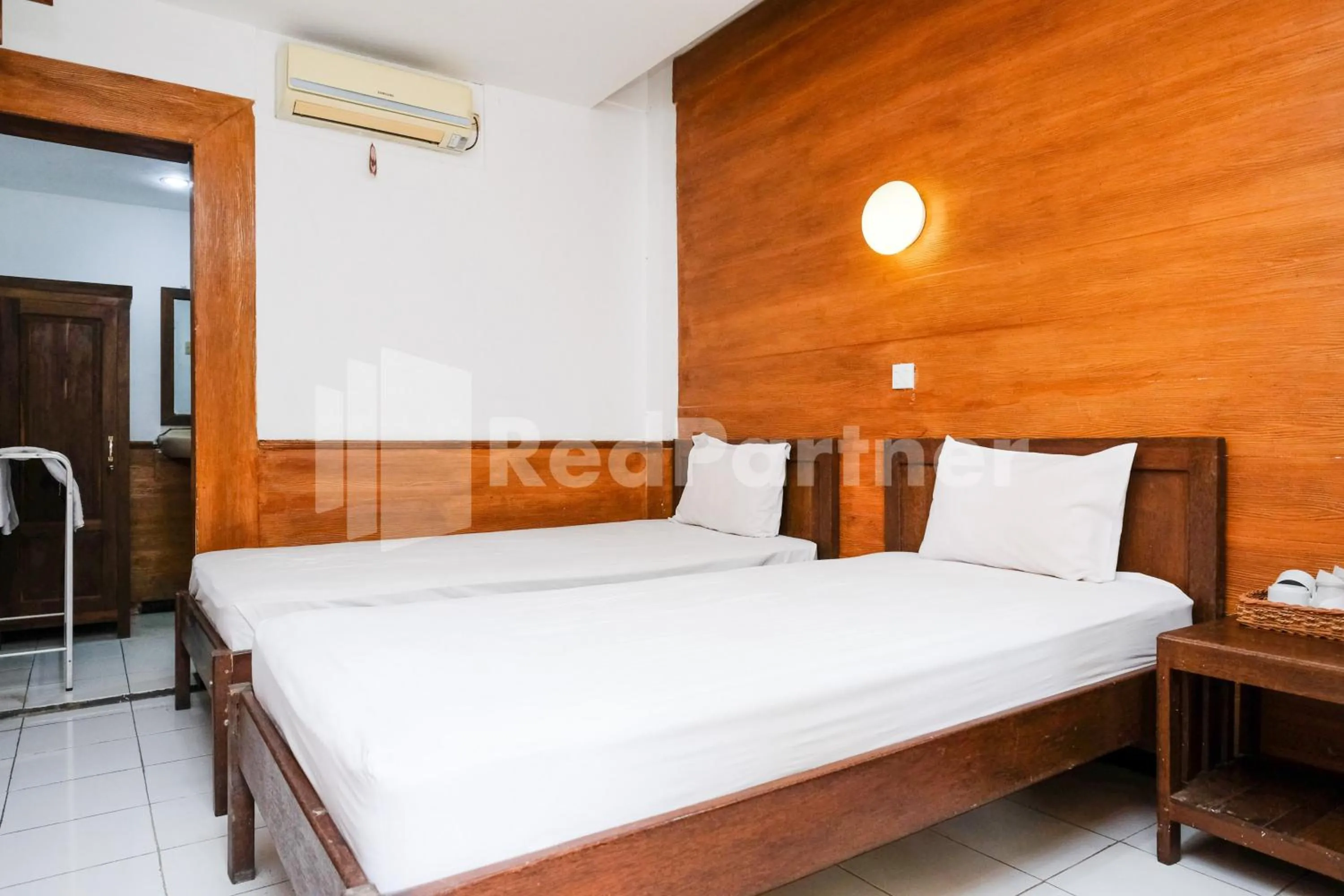 Bedroom, Bed in The Soemarsono Hotel near Ambarrukmo Plaza Mall RedPartner