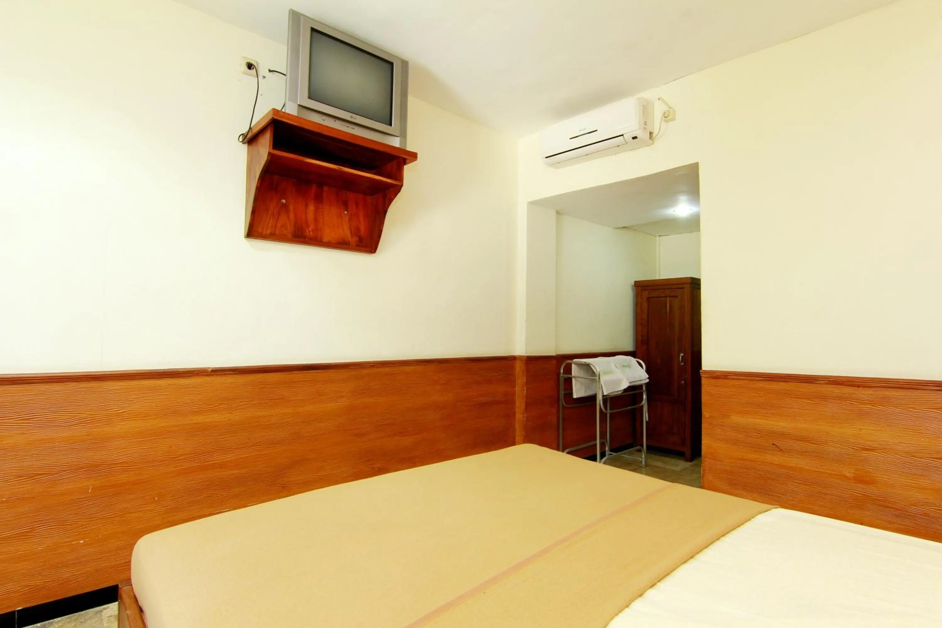 Bed in The Soemarsono Hotel