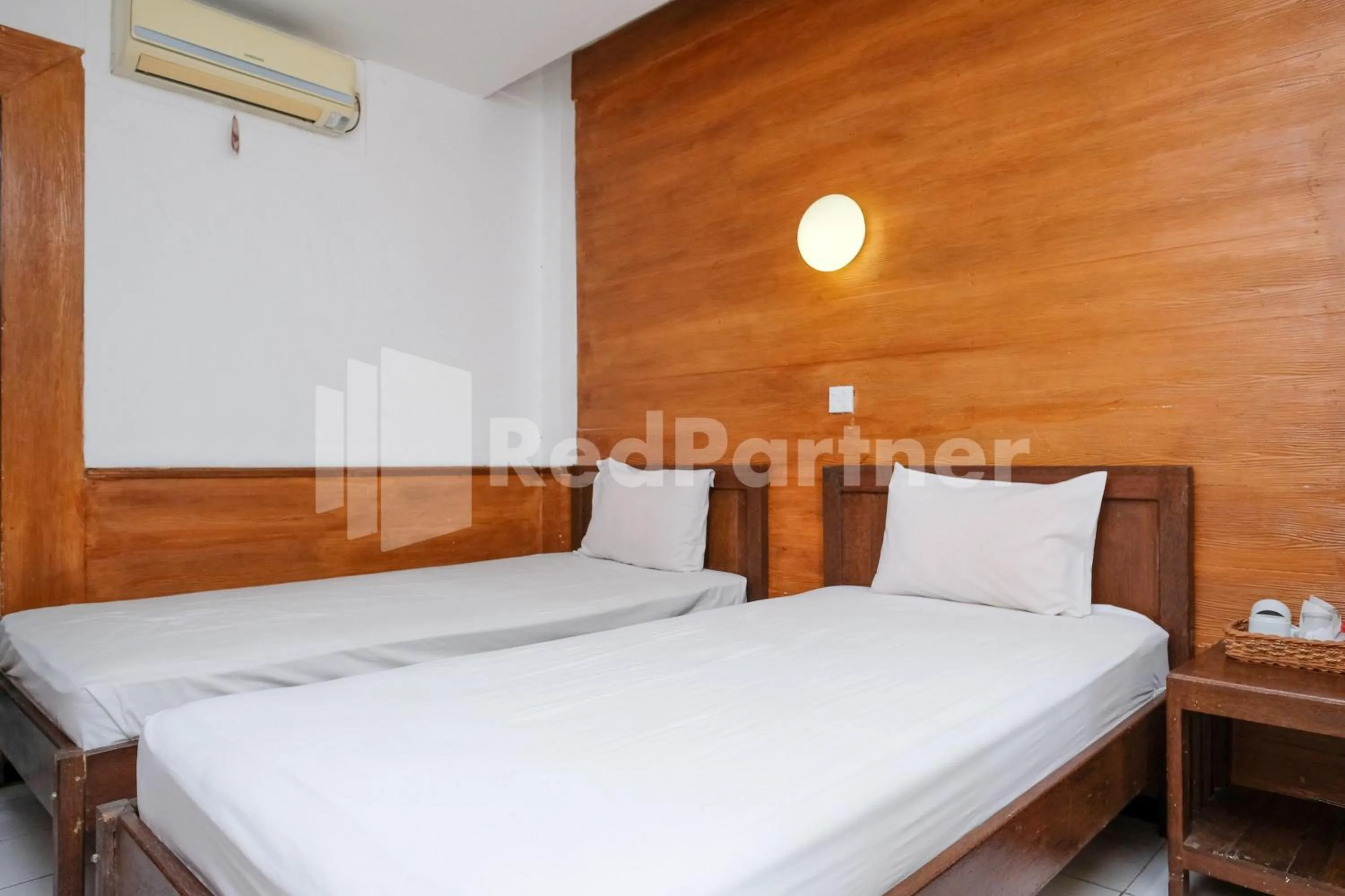 Bedroom, Bed in The Soemarsono Hotel near Ambarrukmo Plaza Mall RedPartner