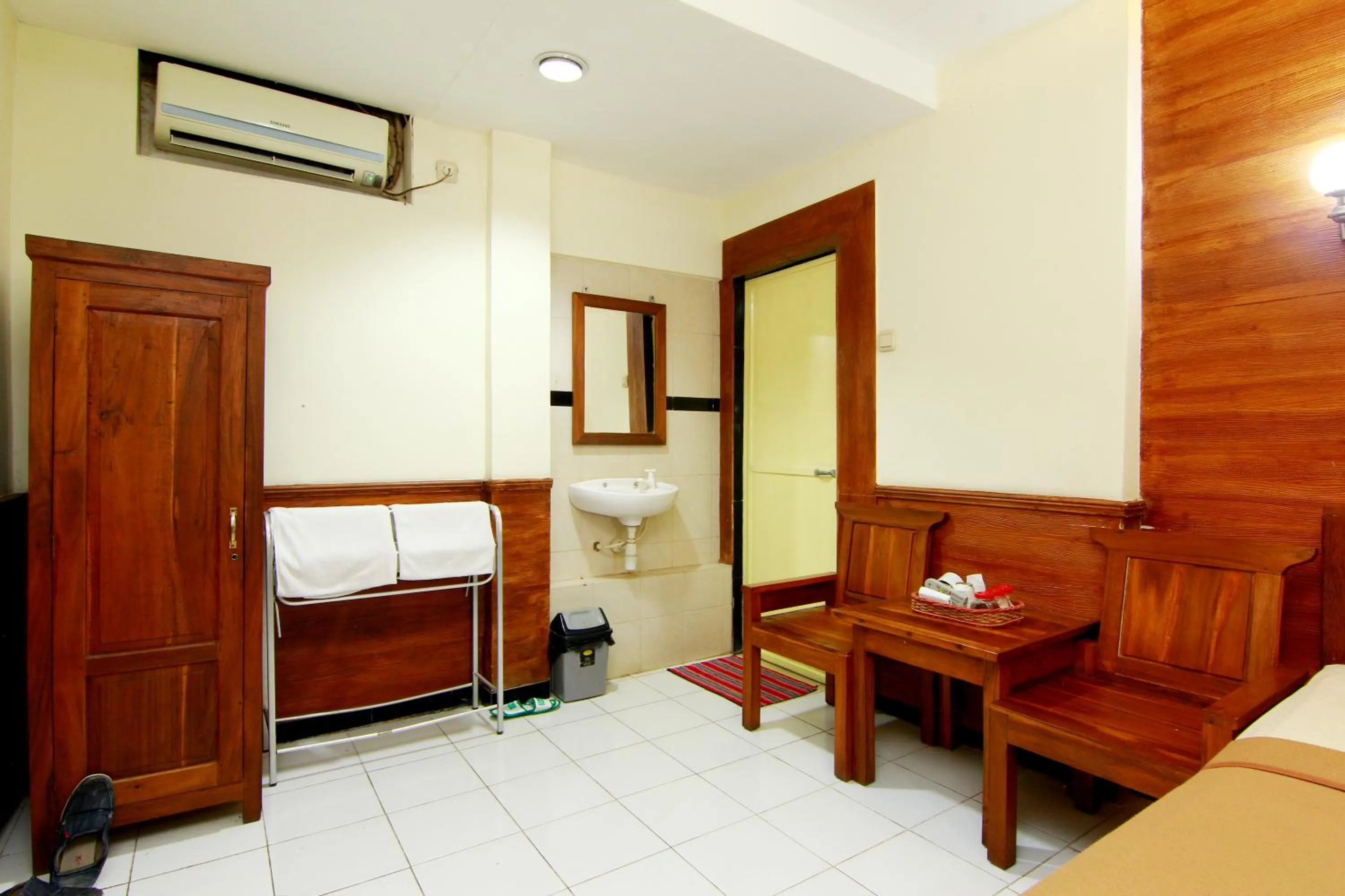 Bed in The Soemarsono Hotel