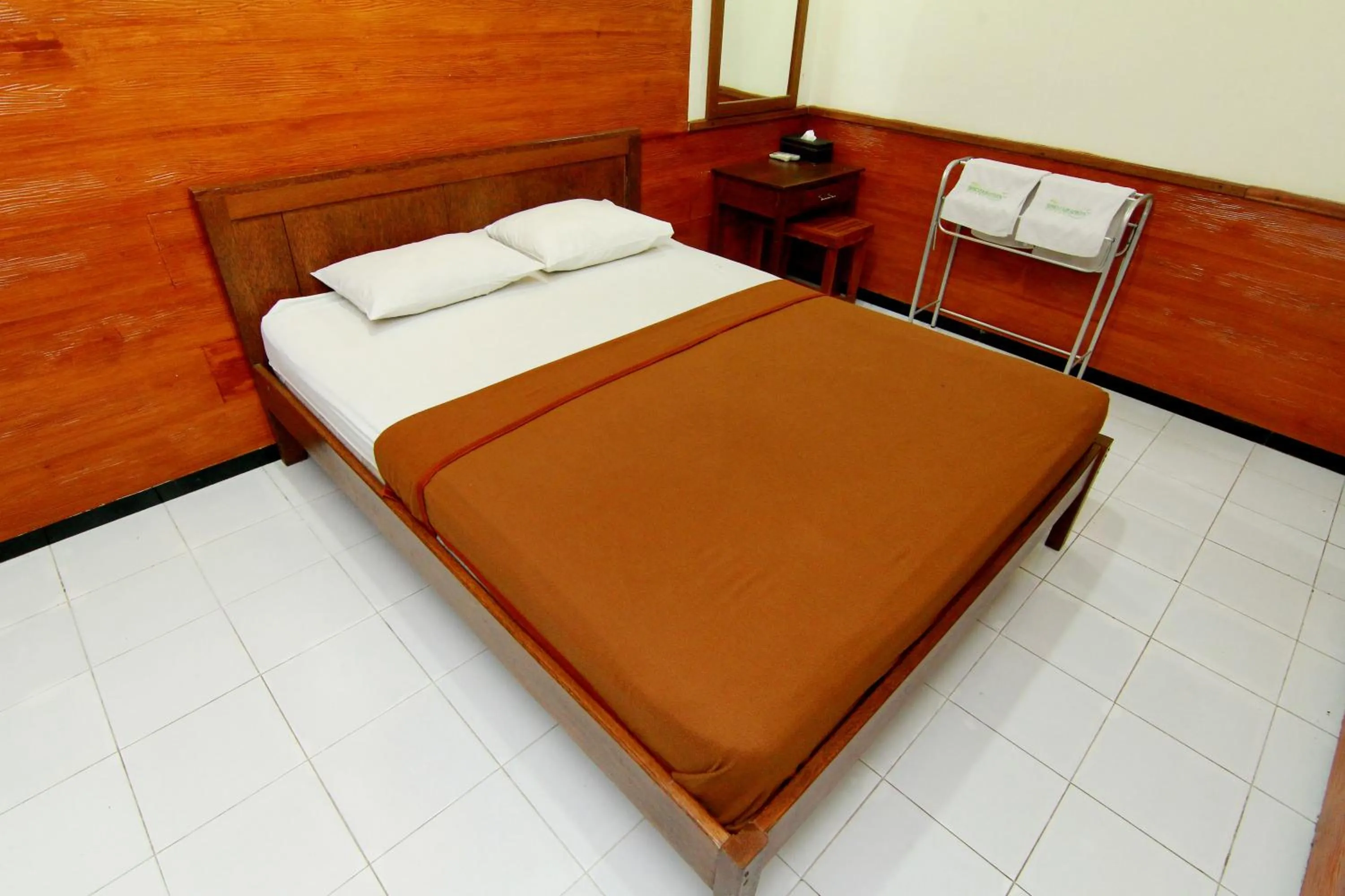 Bed in The Soemarsono Hotel
