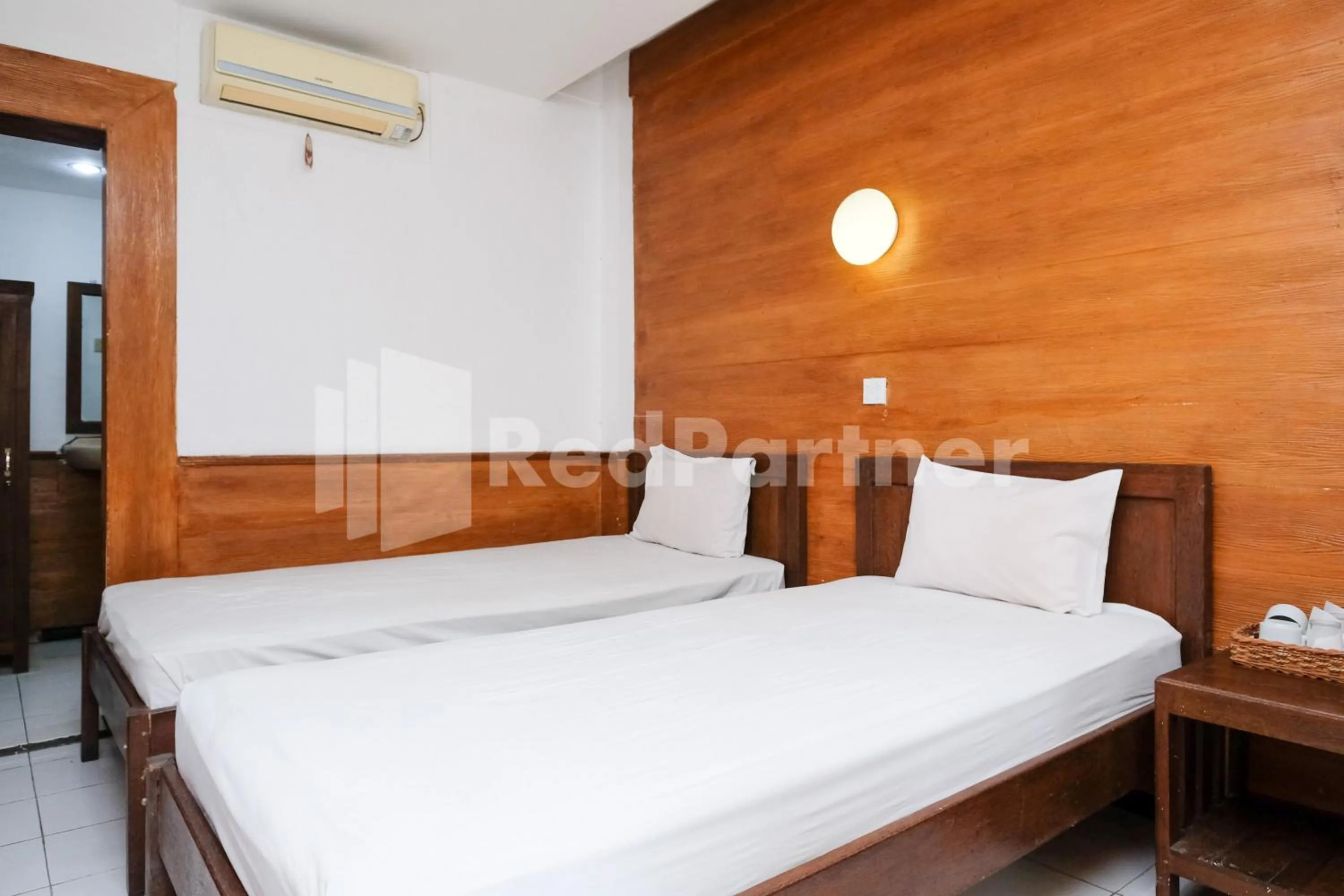 Bedroom, Bed in The Soemarsono Hotel near Ambarrukmo Plaza Mall RedPartner