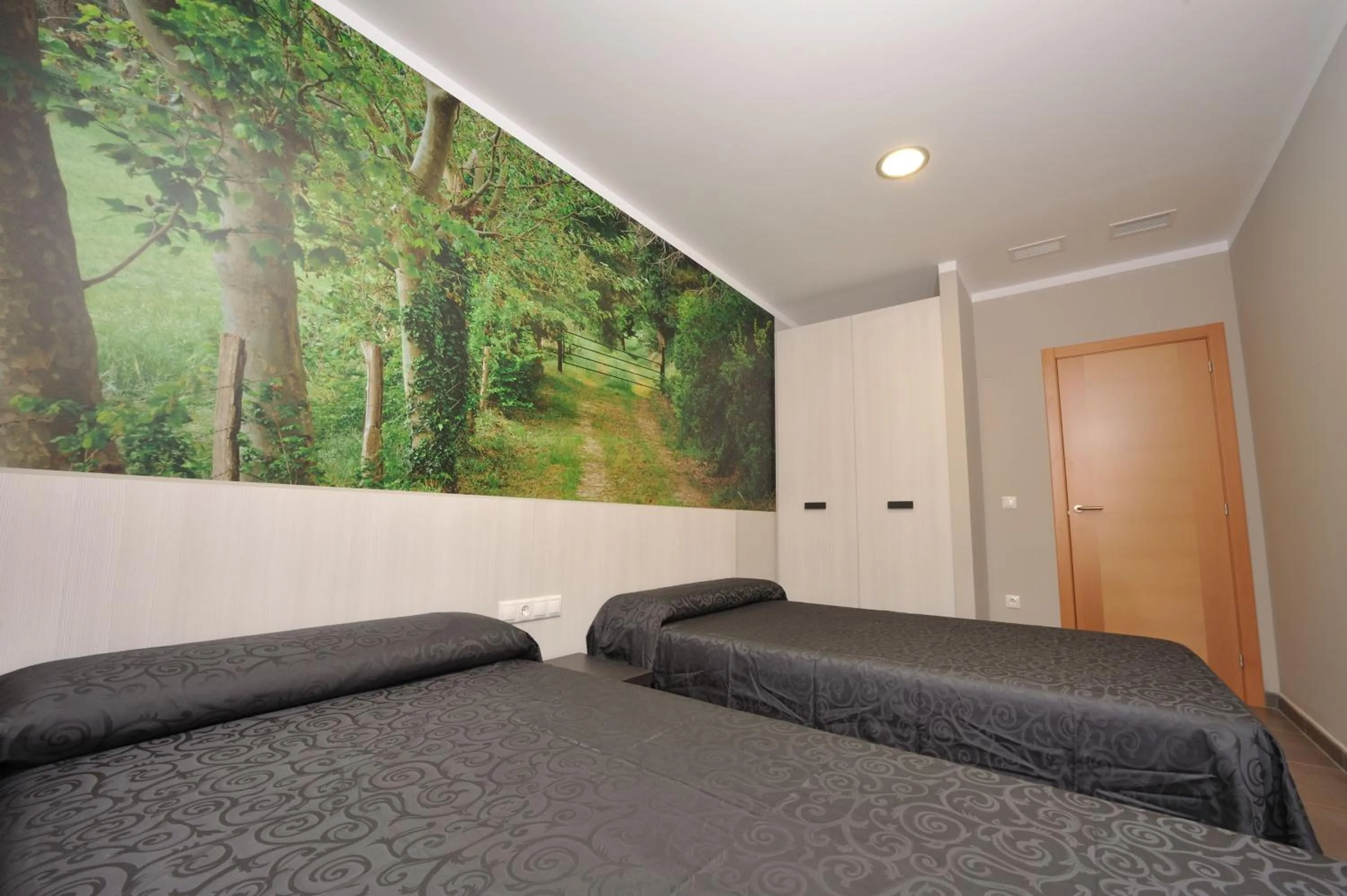 Bed in Aparthotel Meseguer