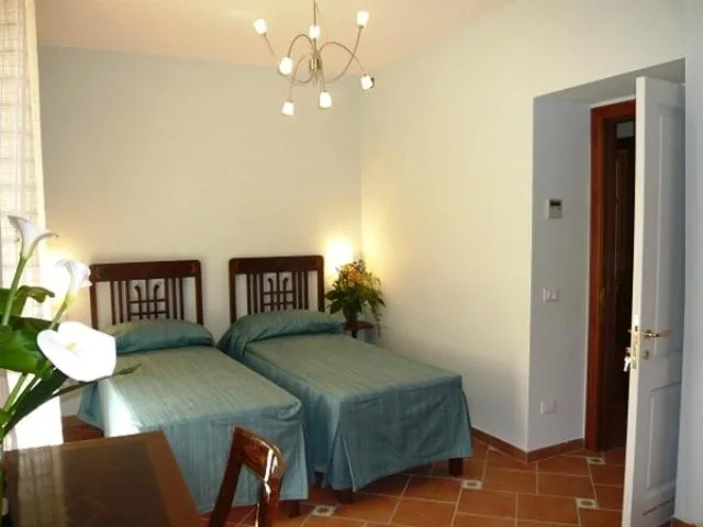 Bed in DolceVitaSorrento Guest House