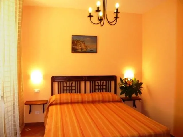 Bed in DolceVitaSorrento Guest House