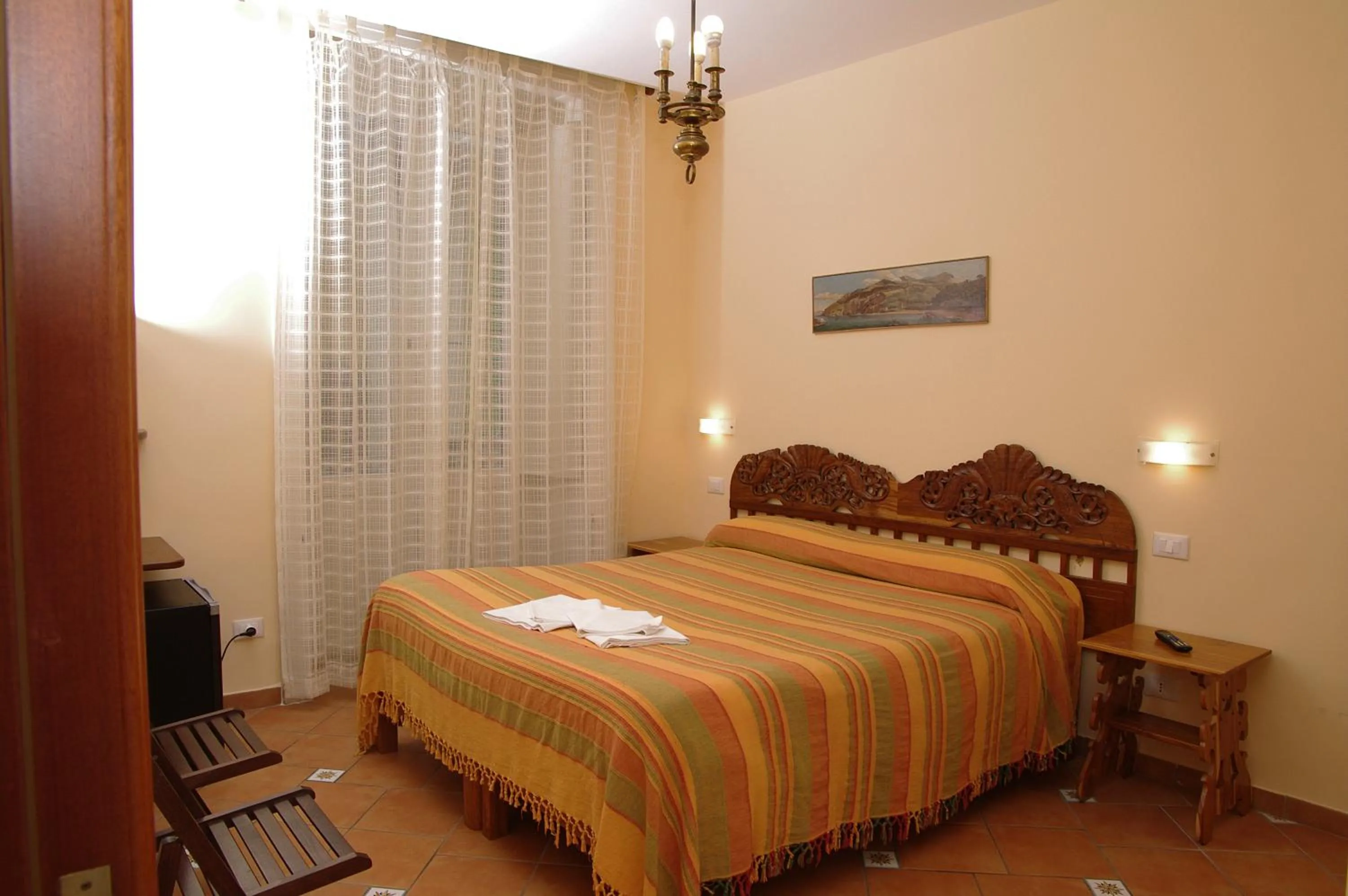 Bed in DolceVitaSorrento Guest House