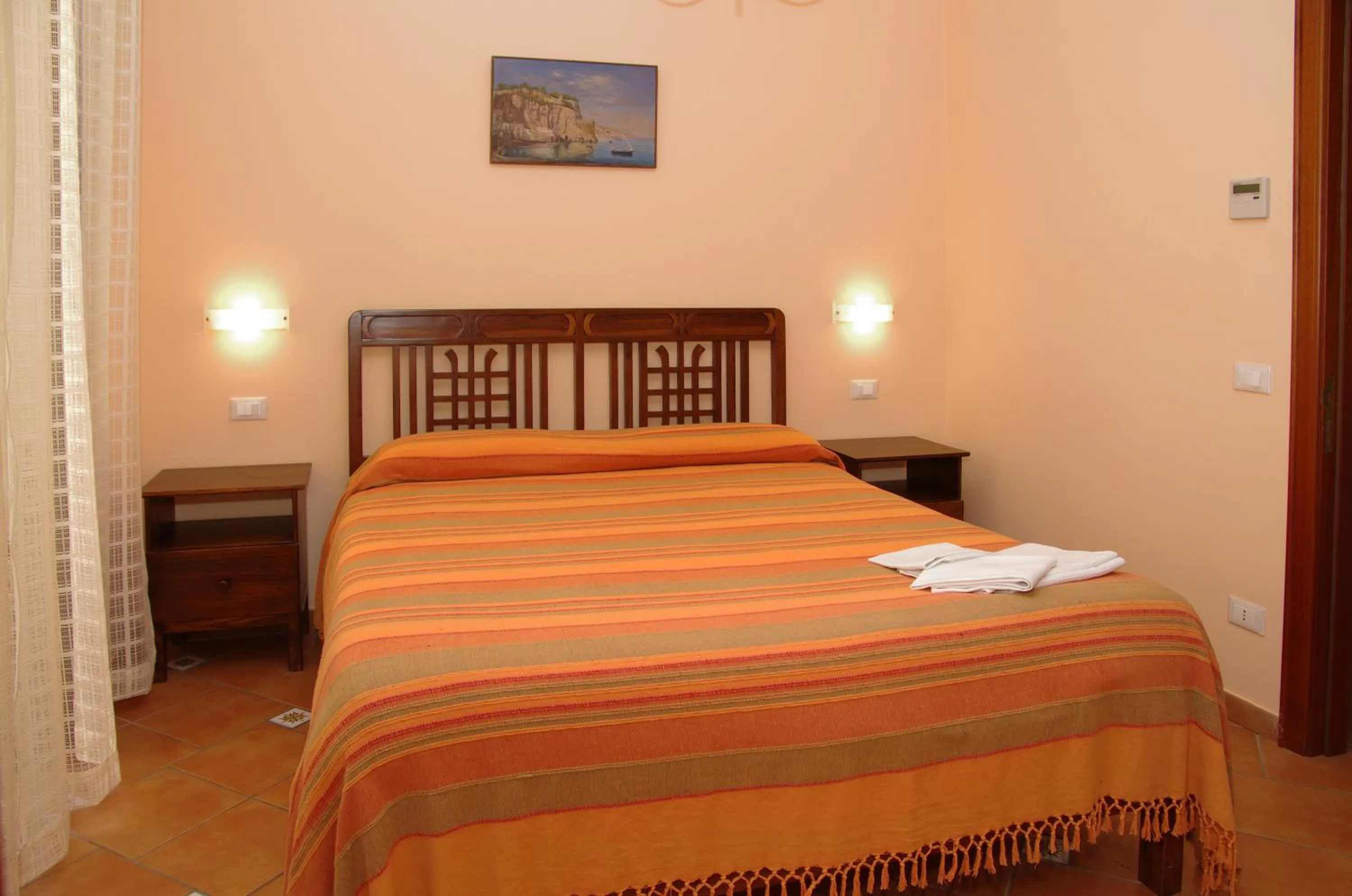 Bed in DolceVitaSorrento Guest House