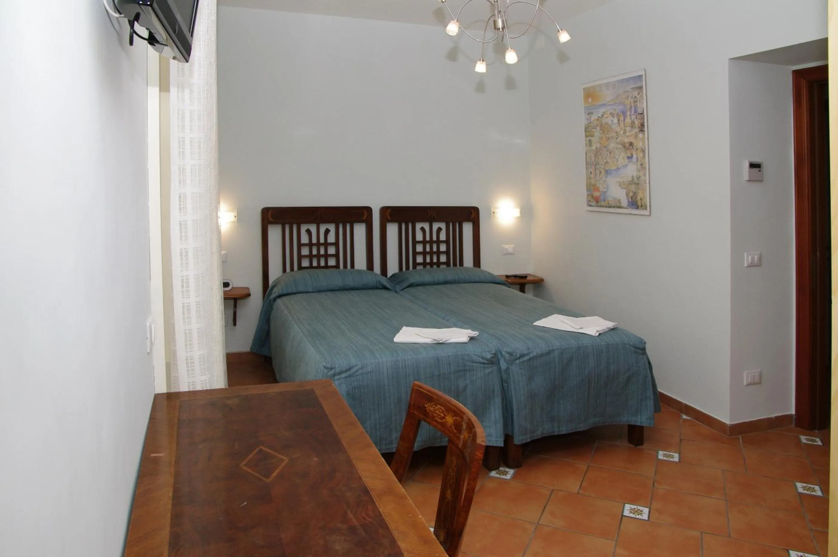 Bed in DolceVitaSorrento Guest House