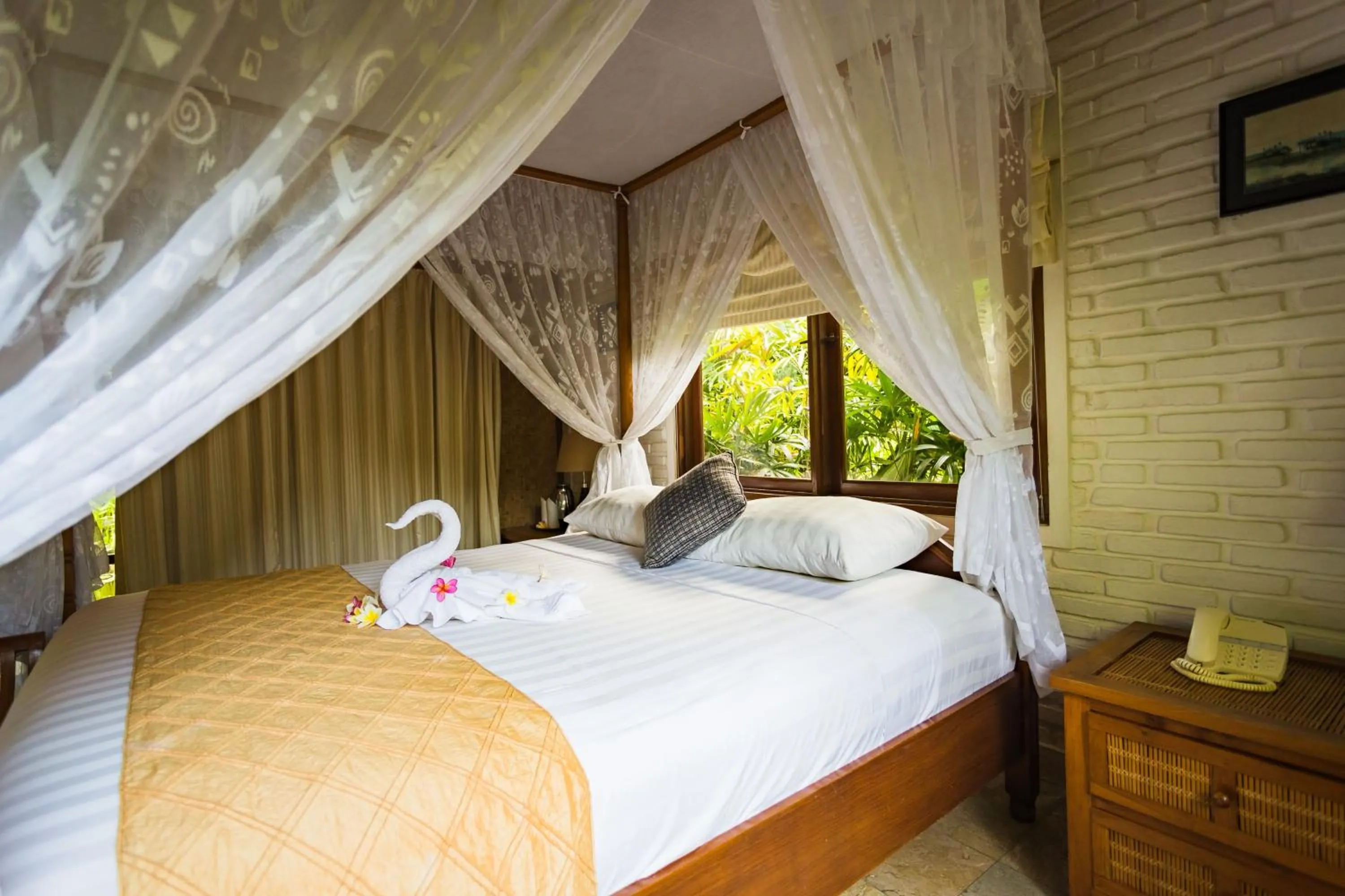 Bed in The Water Garden Hotel