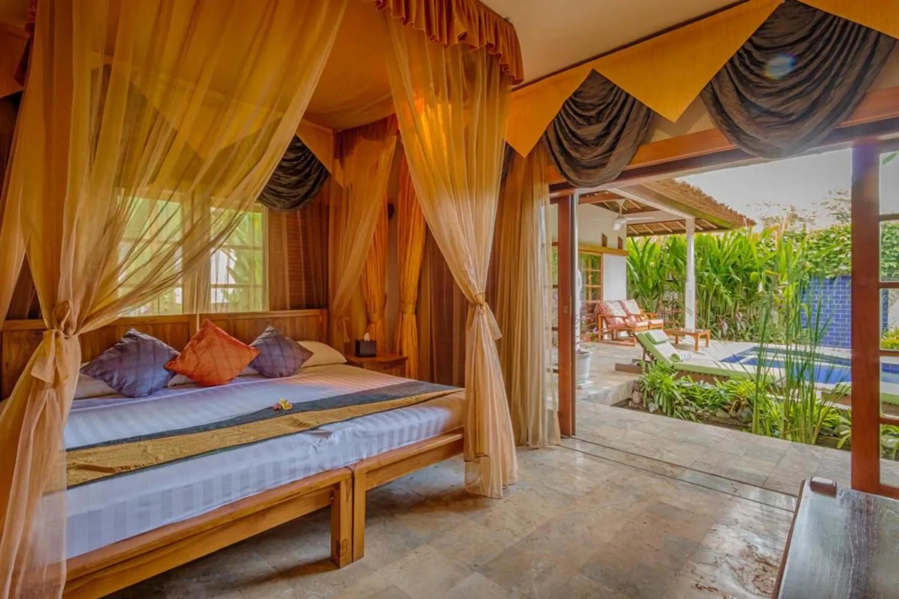 Bed in The Water Garden Hotel