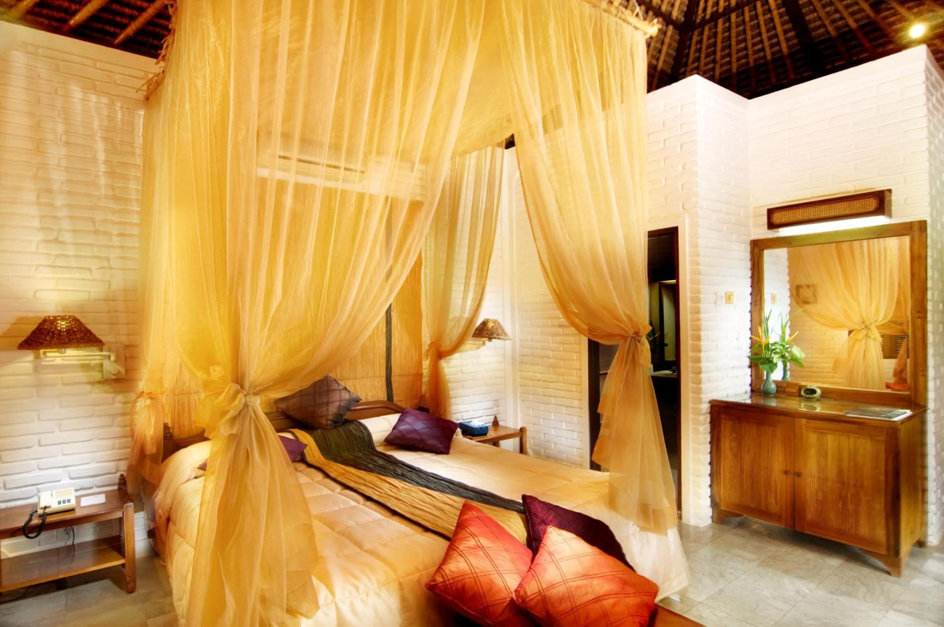 Bed in The Water Garden Hotel