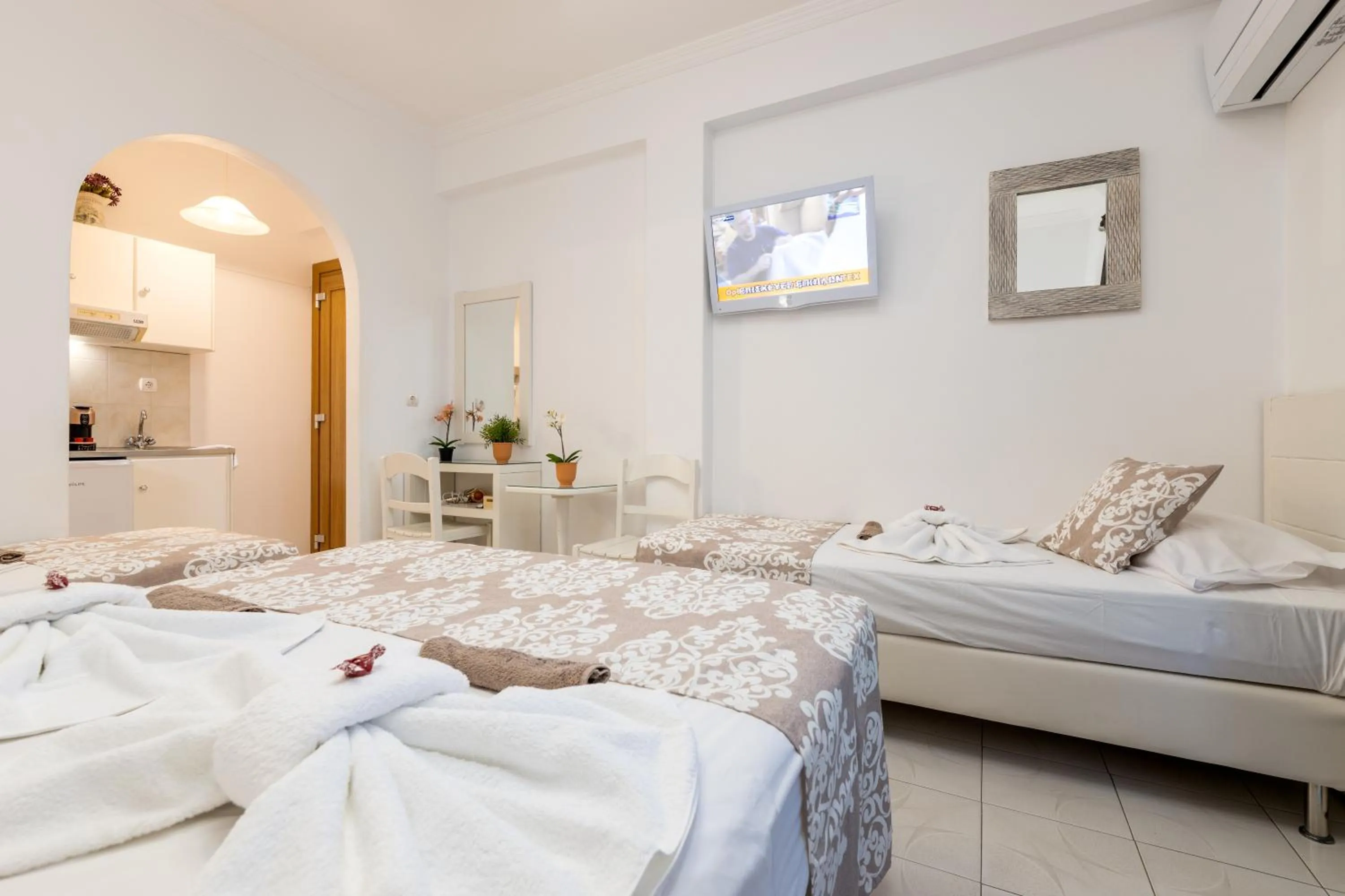 air conditioner, Bed in Panos Luxury Studios