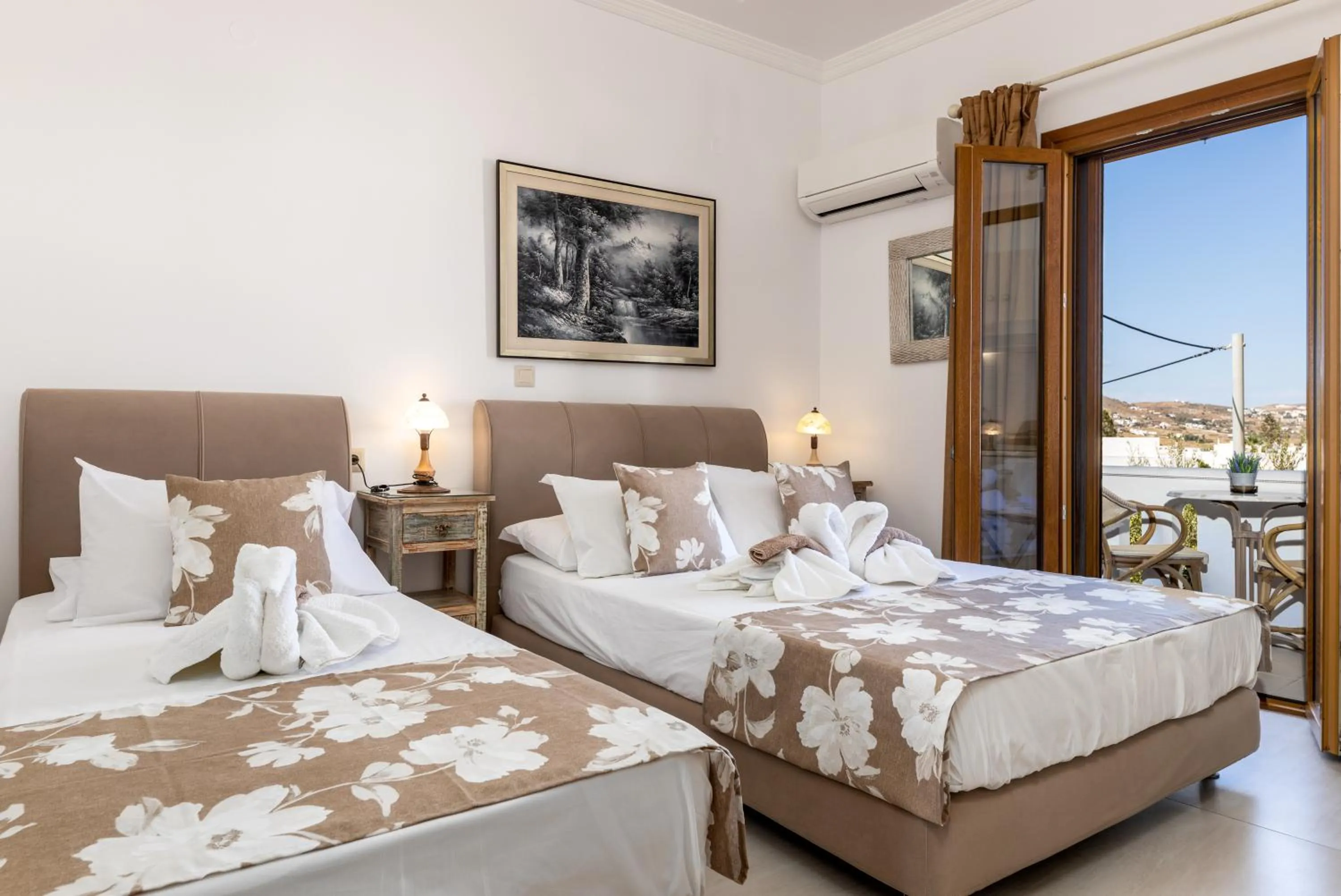 Bed in Panos Luxury Studios