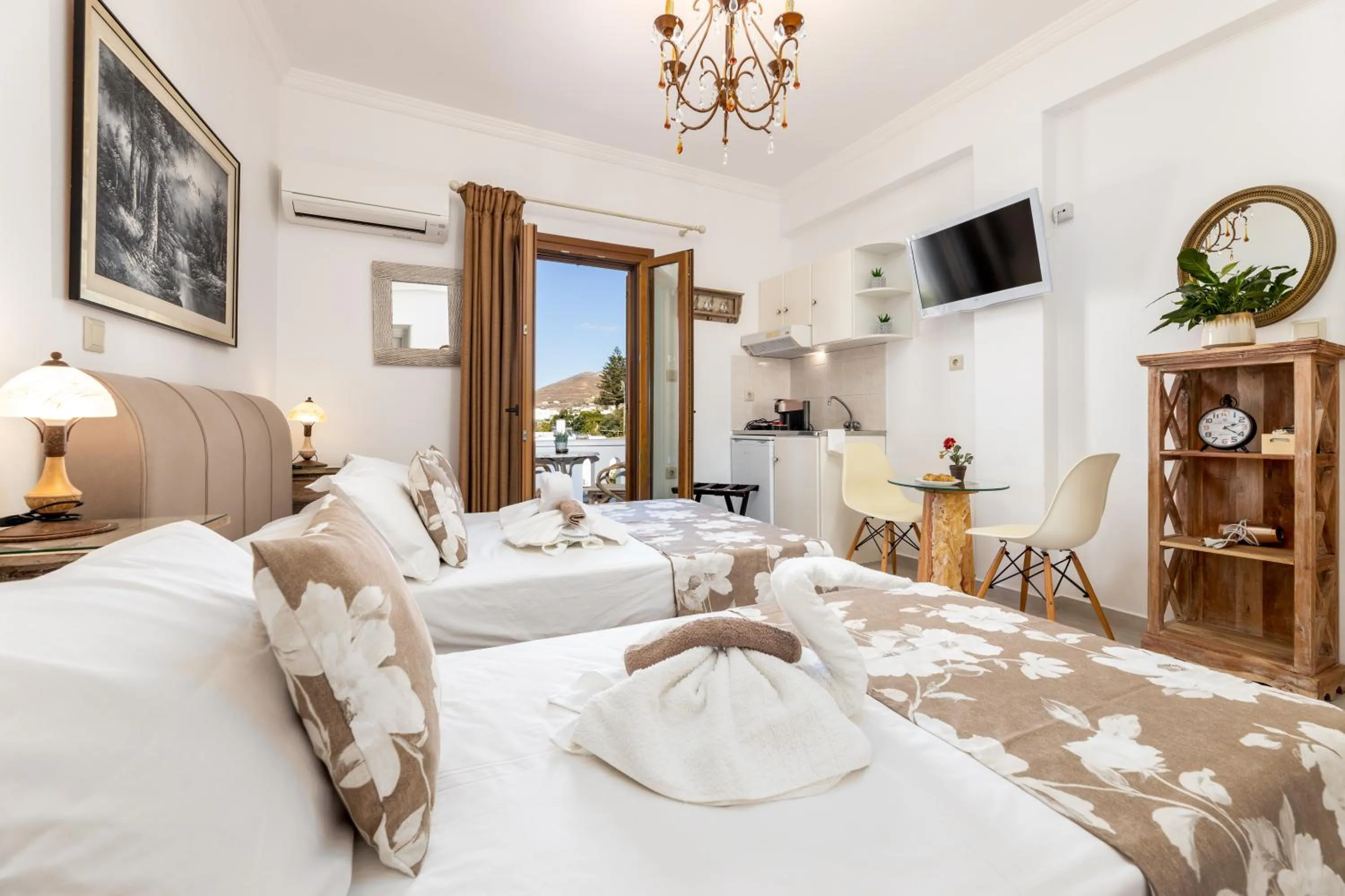 kitchen, Bed in Panos Luxury Studios