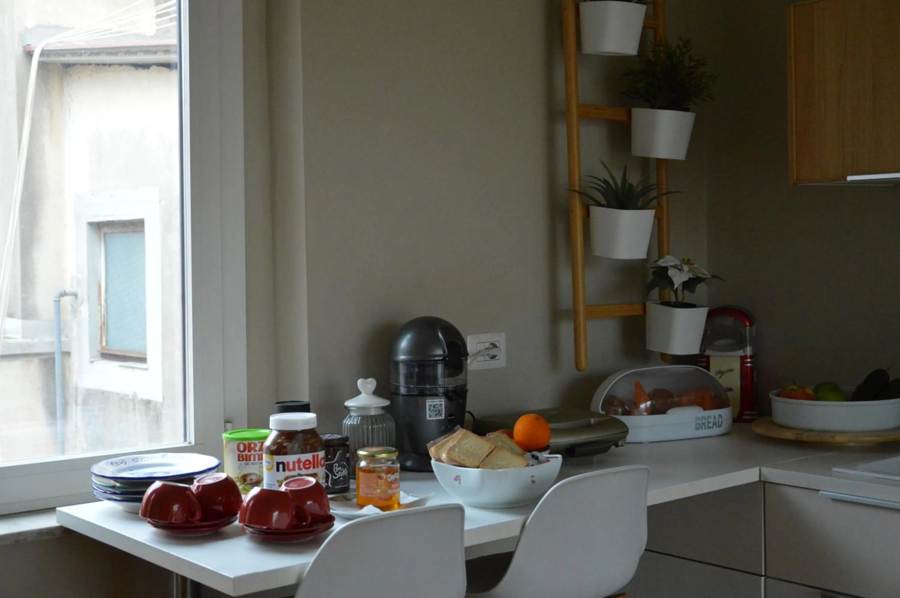 Kitchen or kitchenette in b&b le 4 leggende