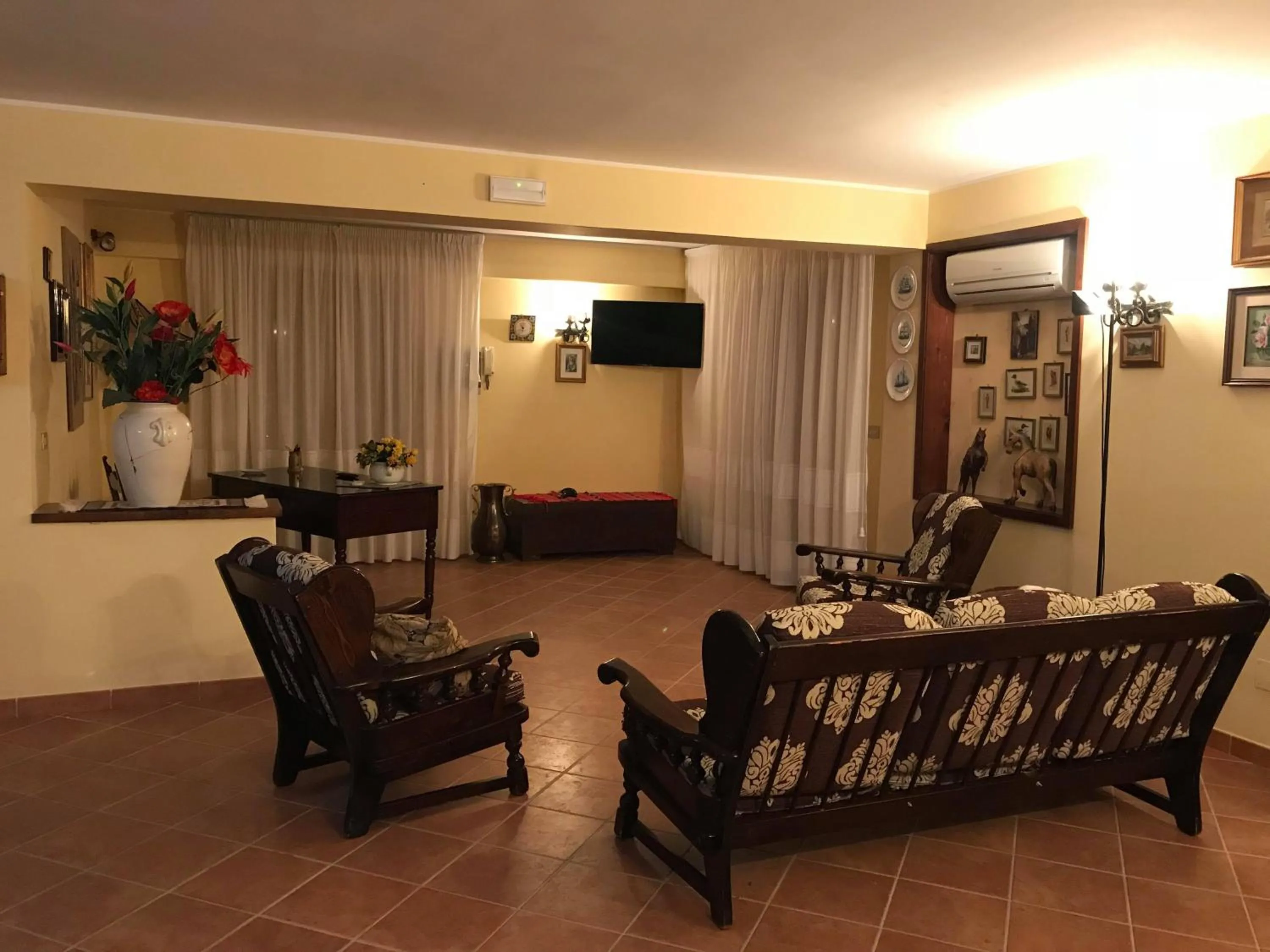 Communal lounge/ TV room in Villa Milici