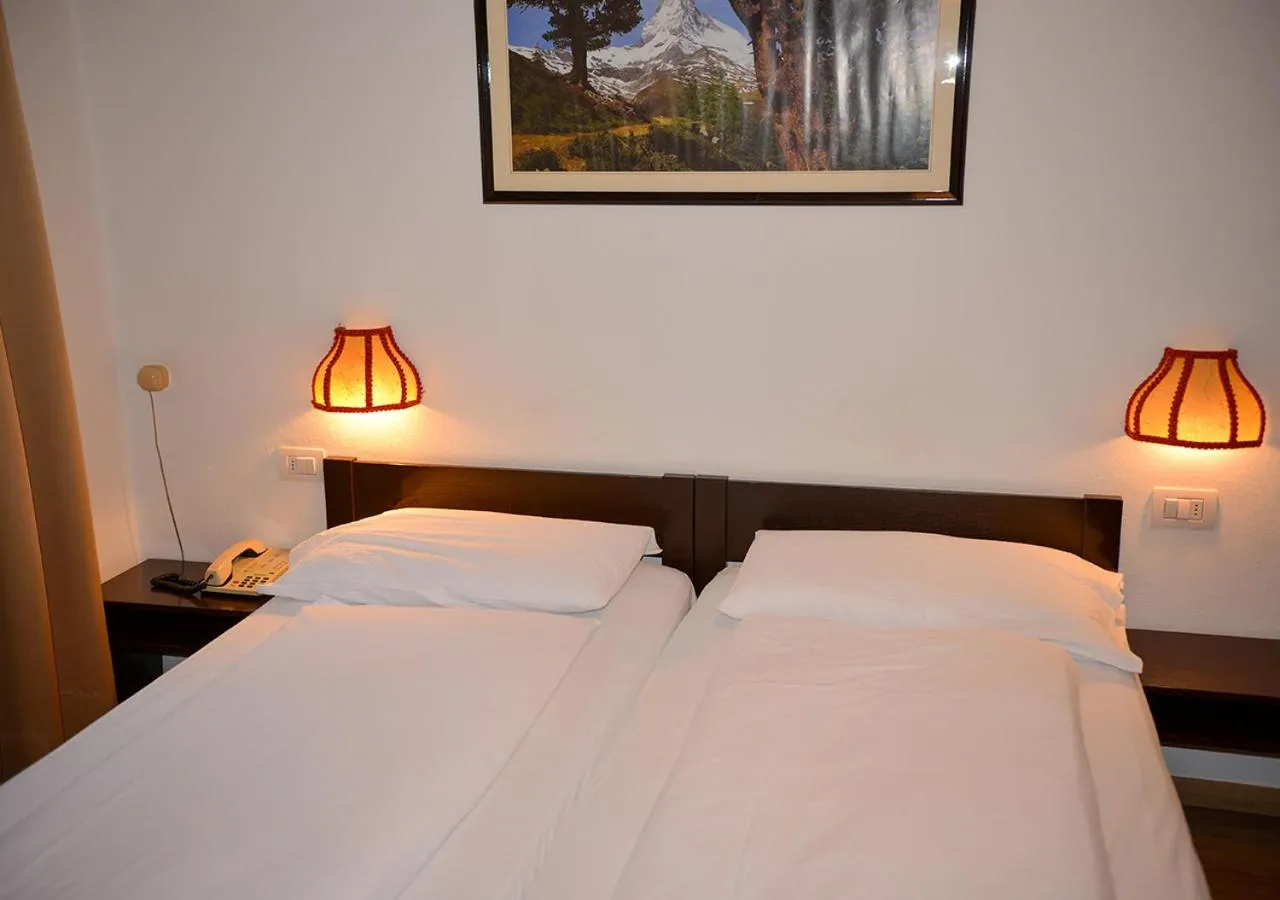 Bed in Hotel Regina Delle Dolomiti