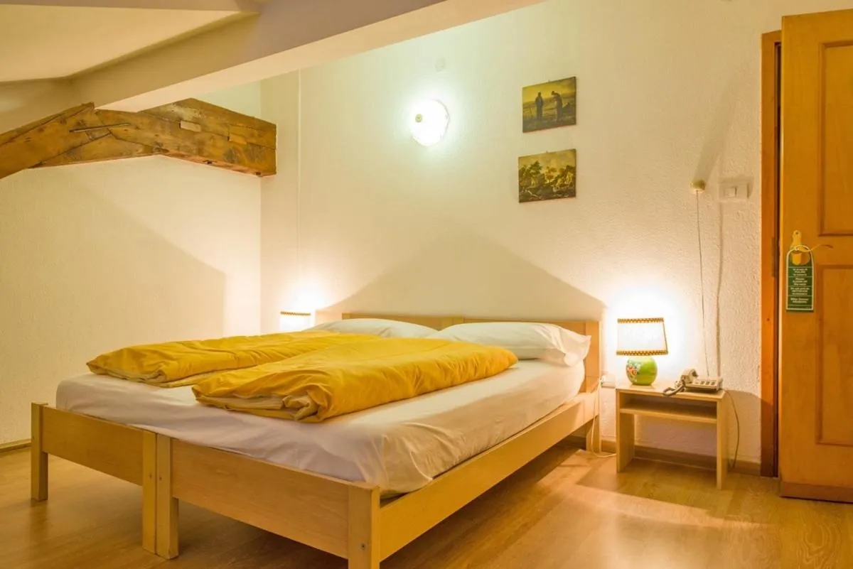 Bed in Hotel Regina Delle Dolomiti