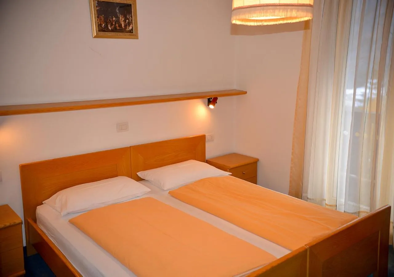 Bed in Hotel Regina Delle Dolomiti