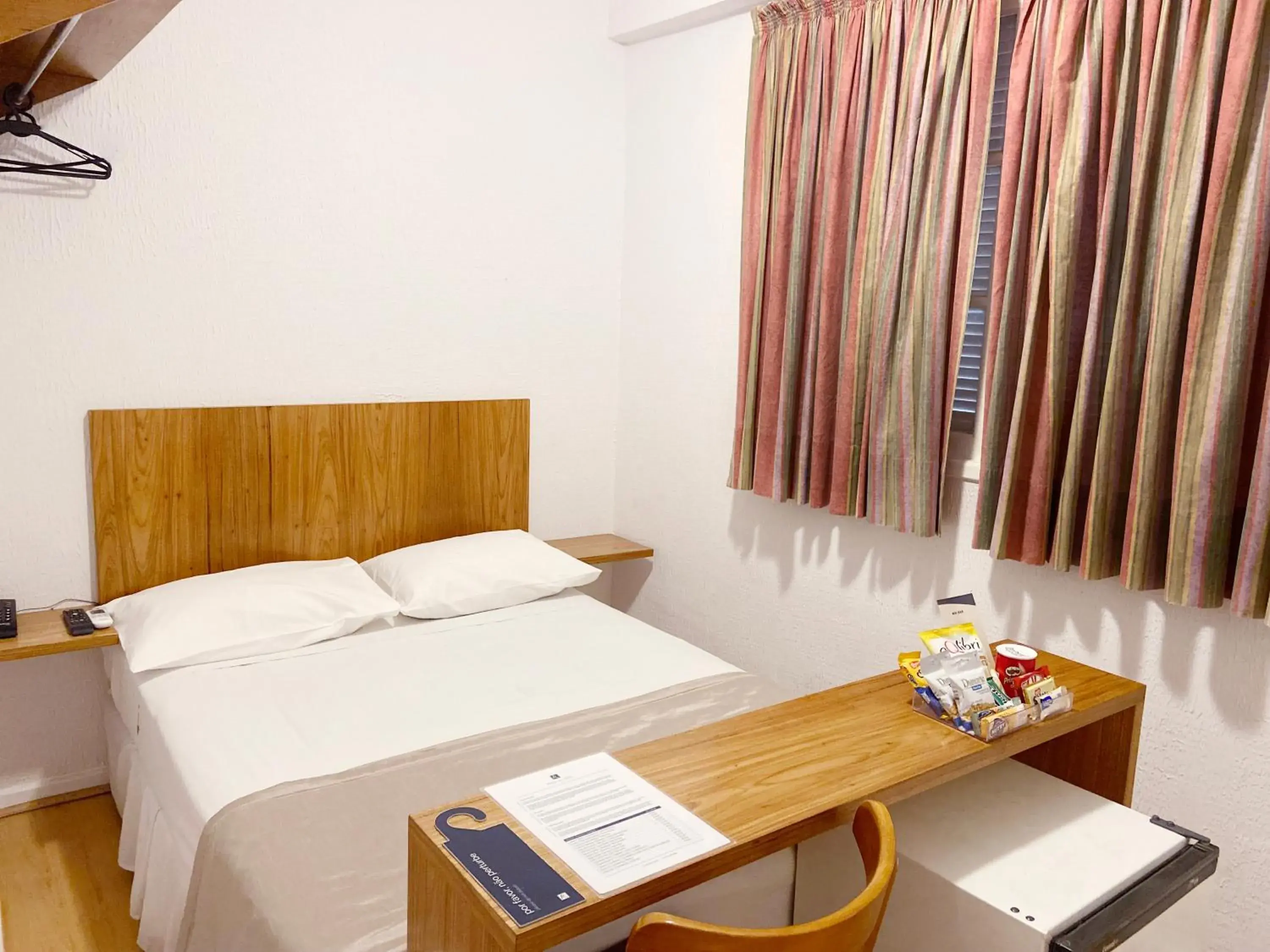 Bed in Hotel Rojas All Suite Bed in Hotel Rojas All Suite