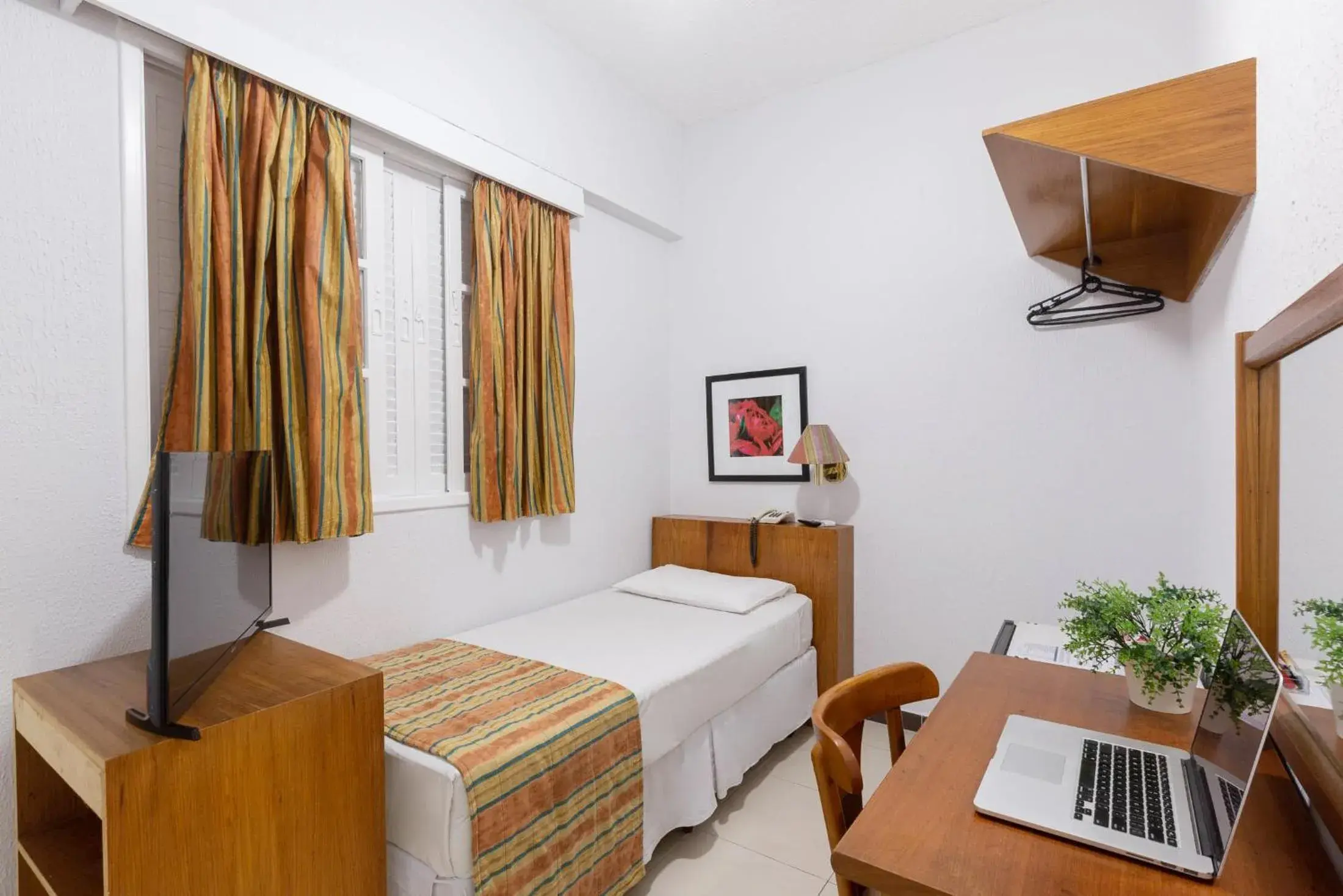 Bed in Hotel Rojas All Suite Bed in Hotel Rojas All Suite