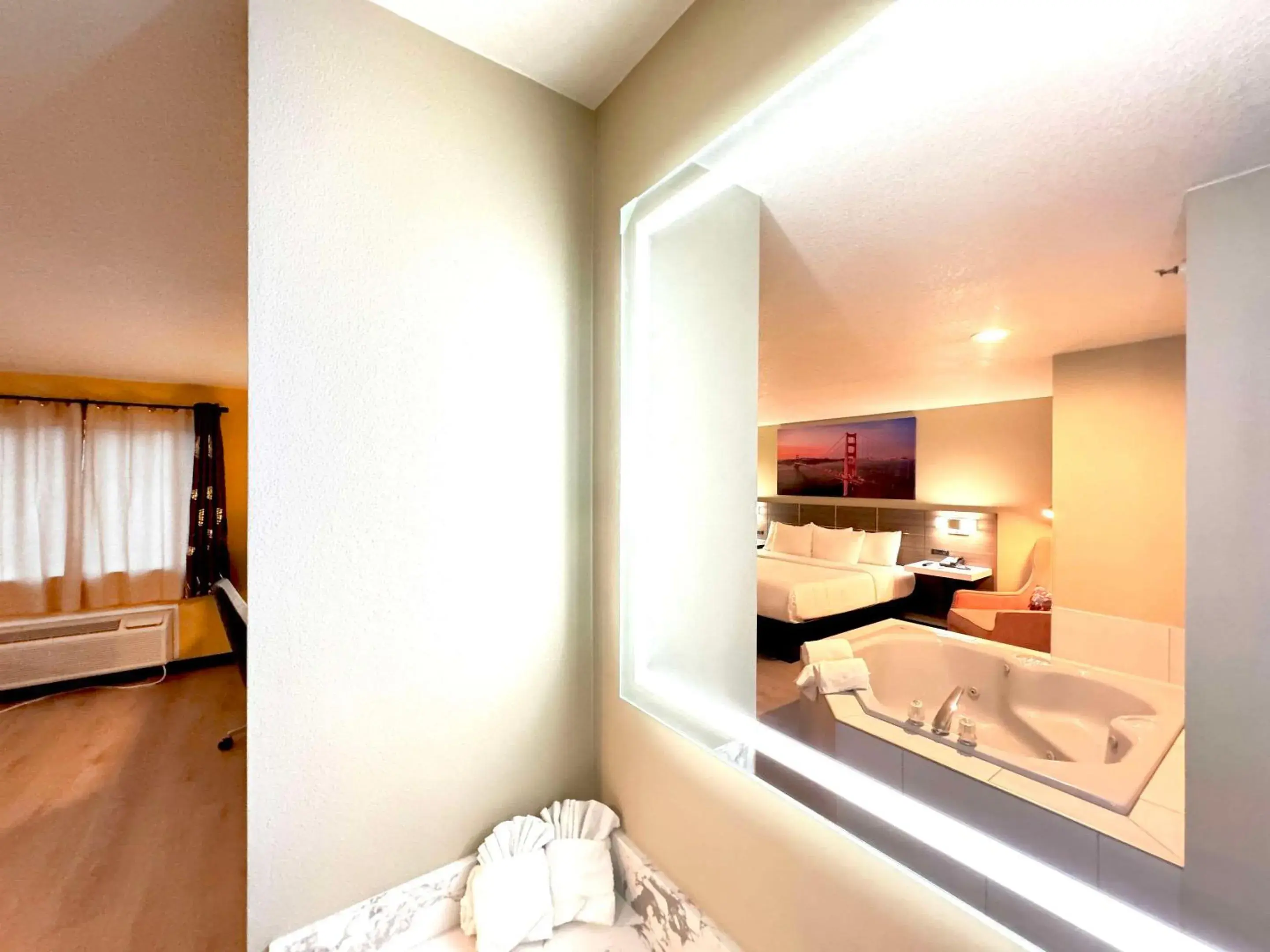 Bedroom, Bathroom in Rodeway Inn & Suites