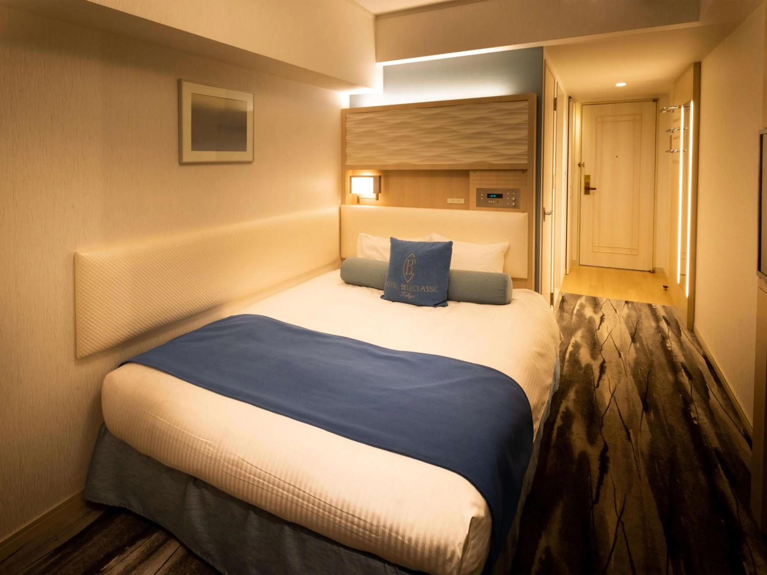 Bed in Hotel Bellclassic Tokyo