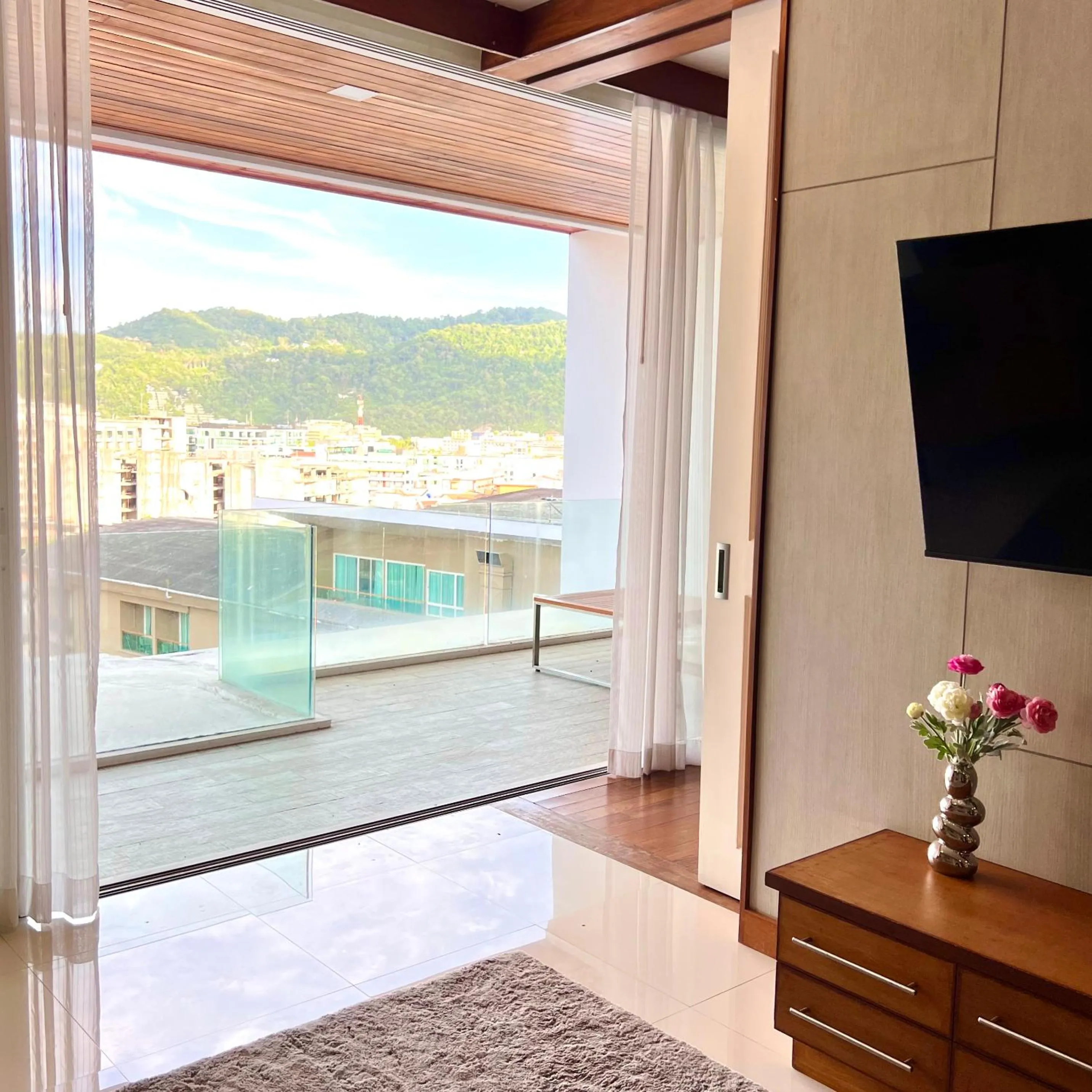 Communal lounge/ TV room in Q Kata Residence