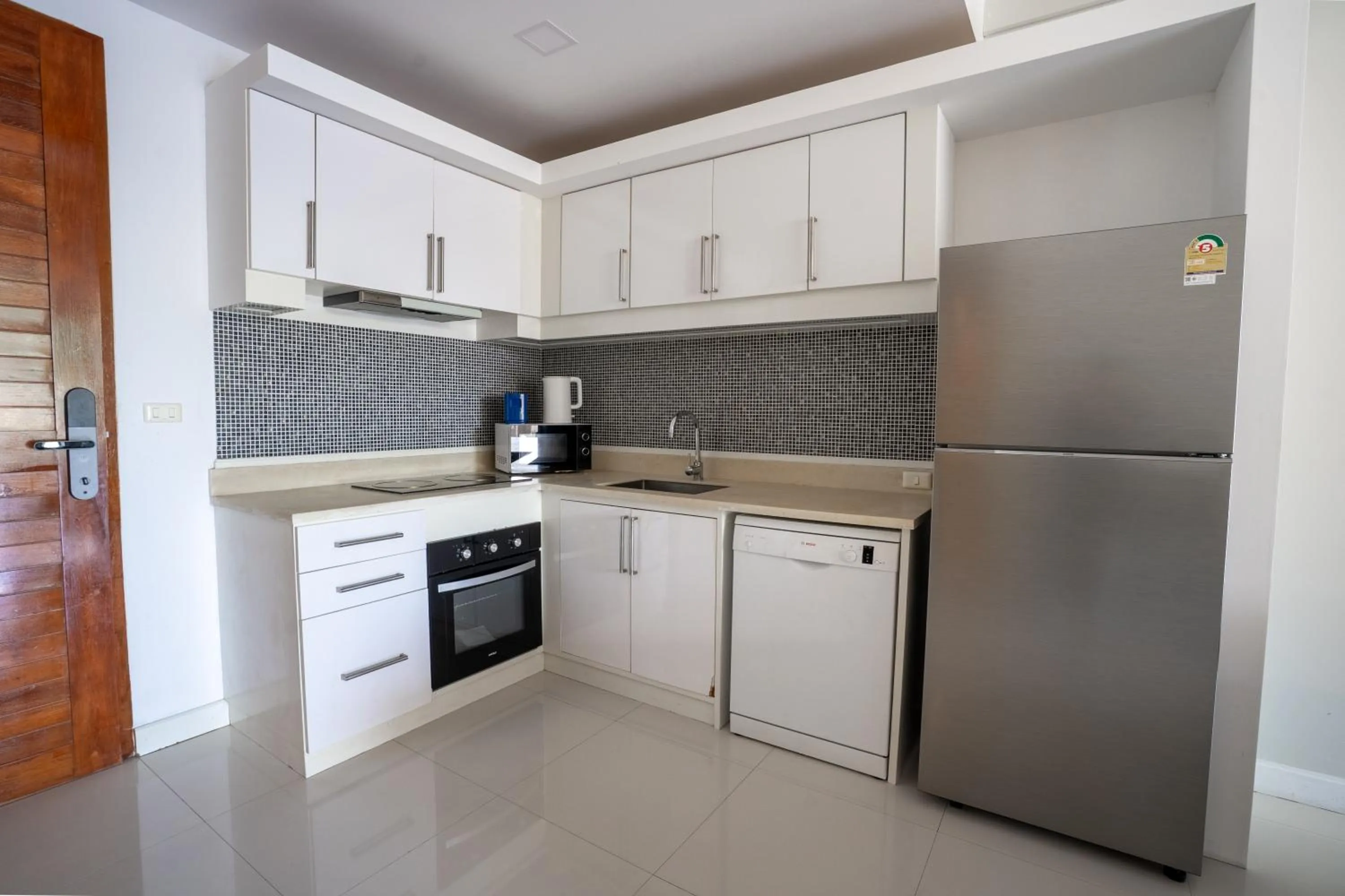 Kitchen or kitchenette in Q Kata Residence