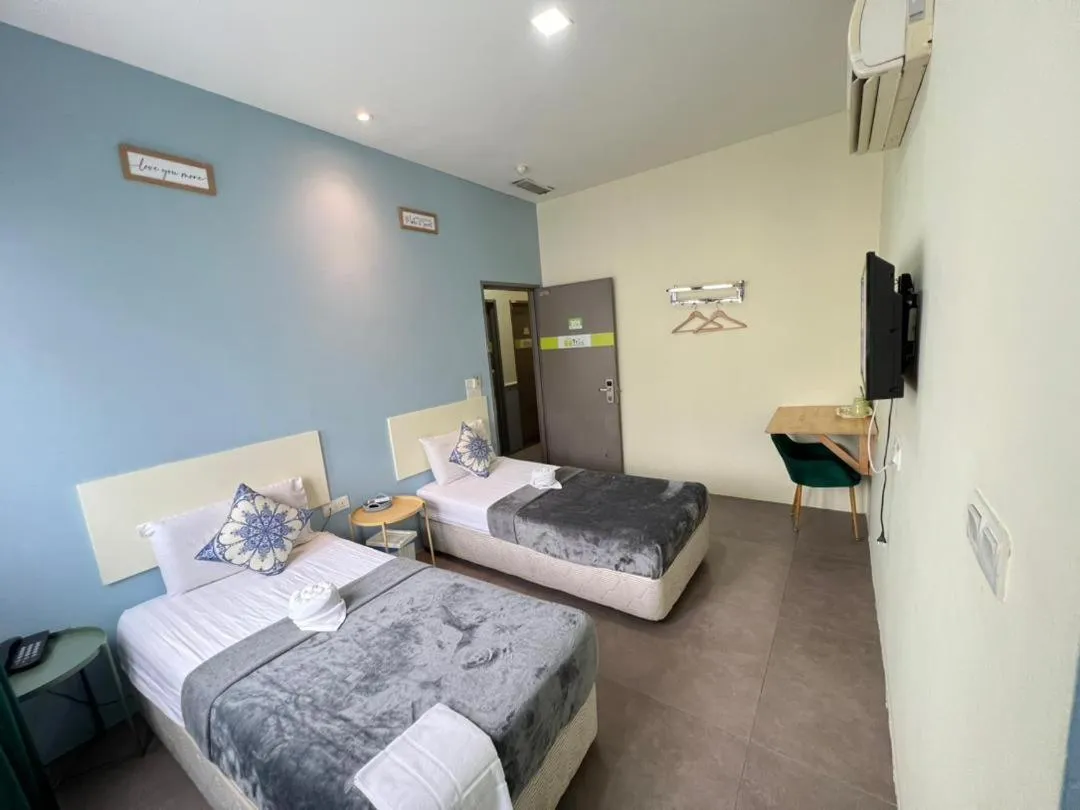 Bed in The Tree Boutique Hotel