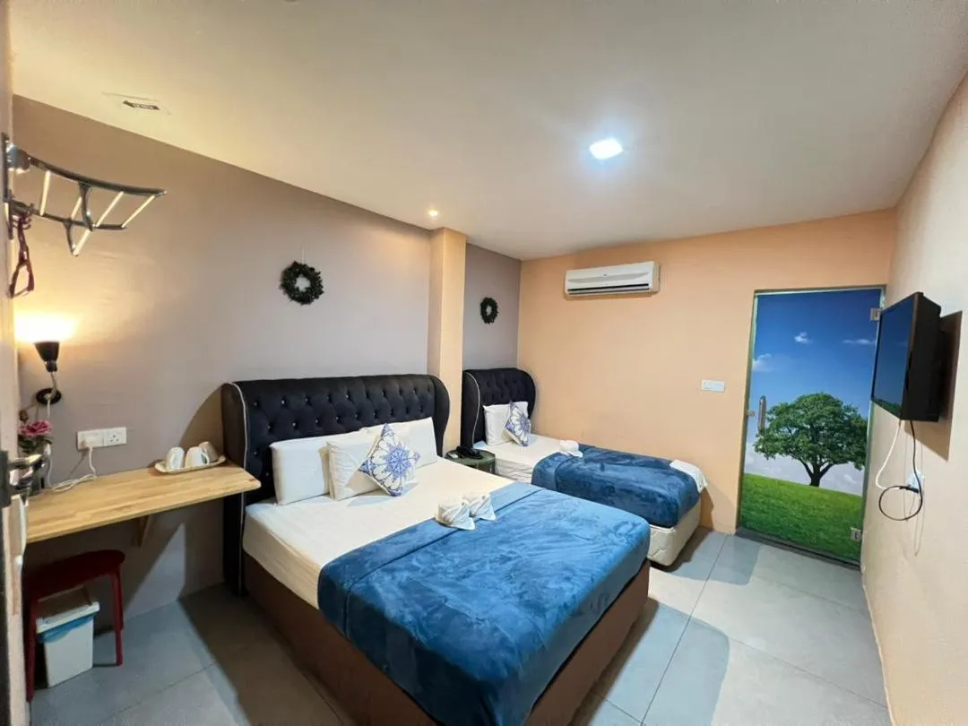 Bed in The Tree Boutique Hotel