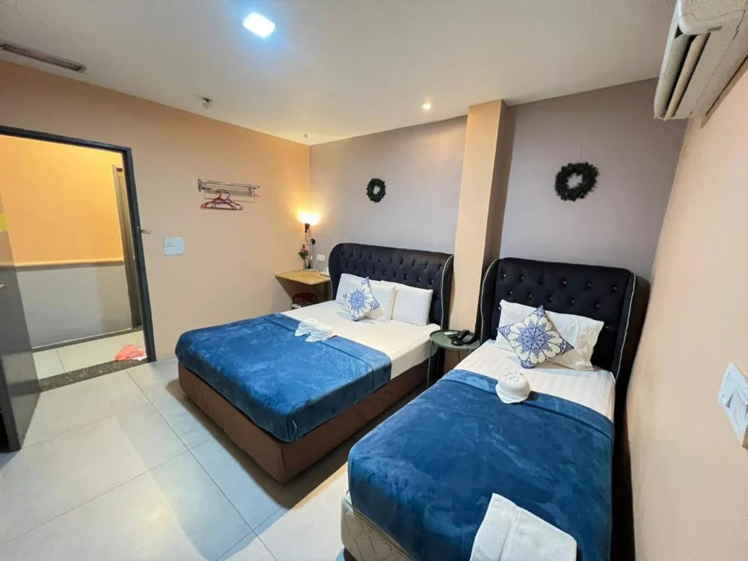 Bed in The Tree Boutique Hotel