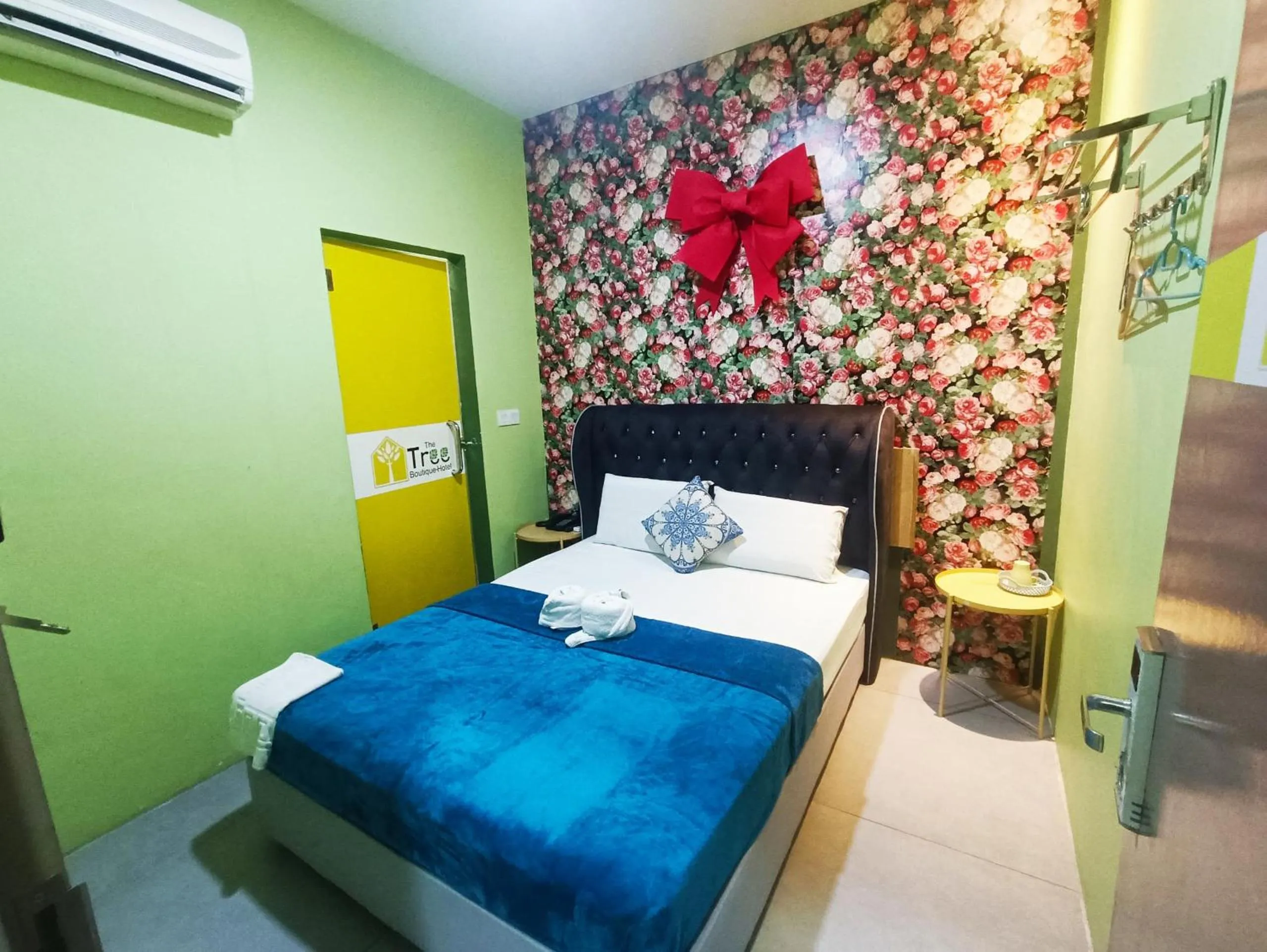 Bed in The Tree Boutique Hotel