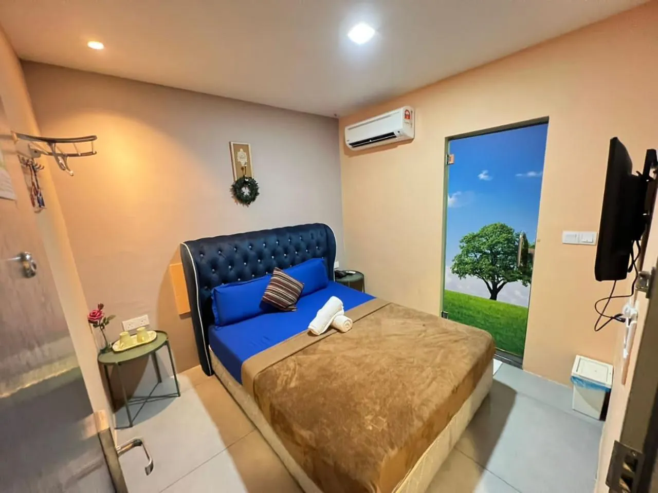 Bed in The Tree Boutique Hotel