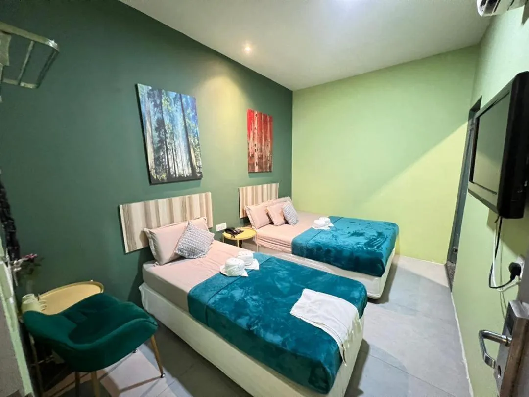 Bed in The Tree Boutique Hotel