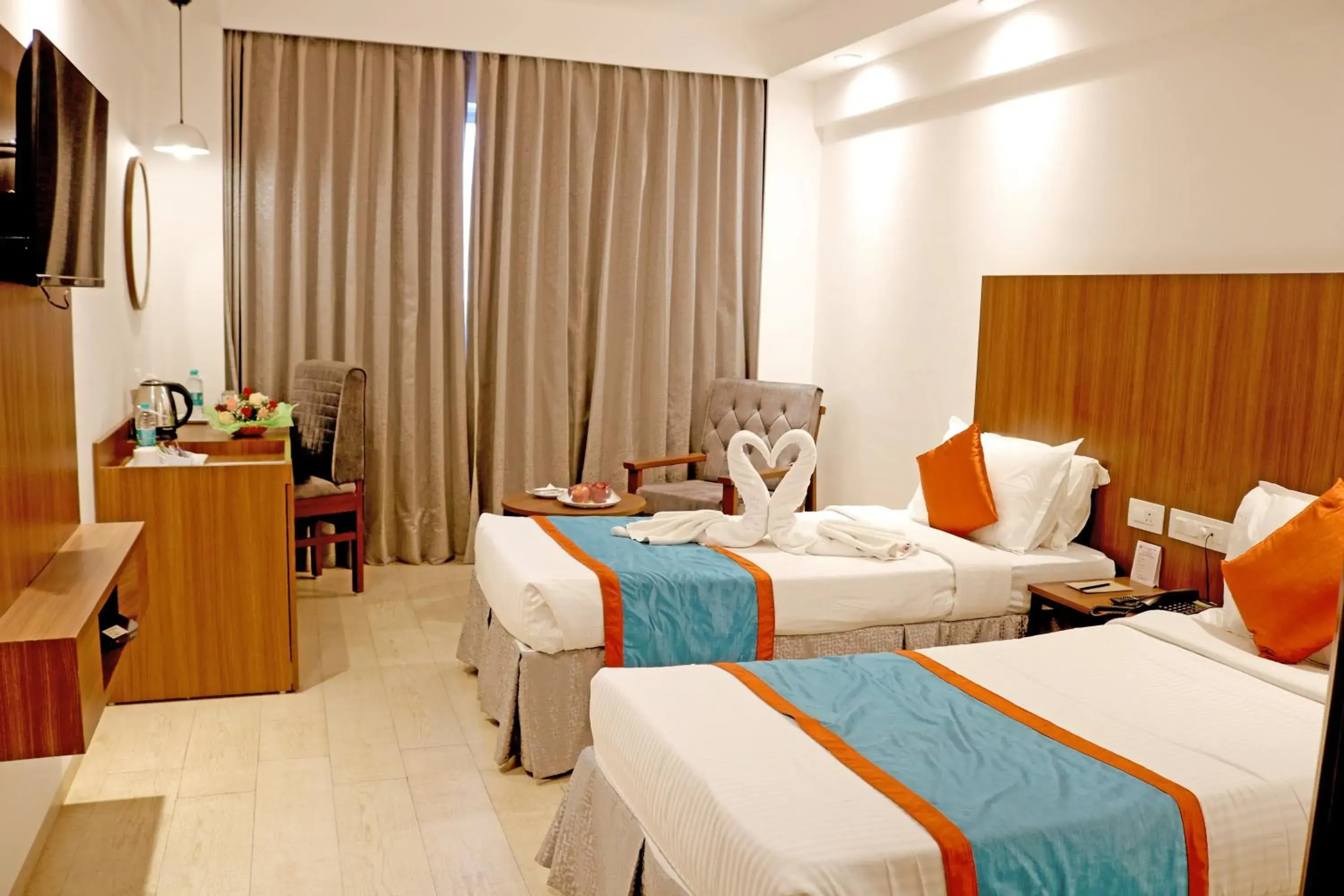 Bed in Ramee Guestline Tirupati Bed in Ramee Guestline Tirupati