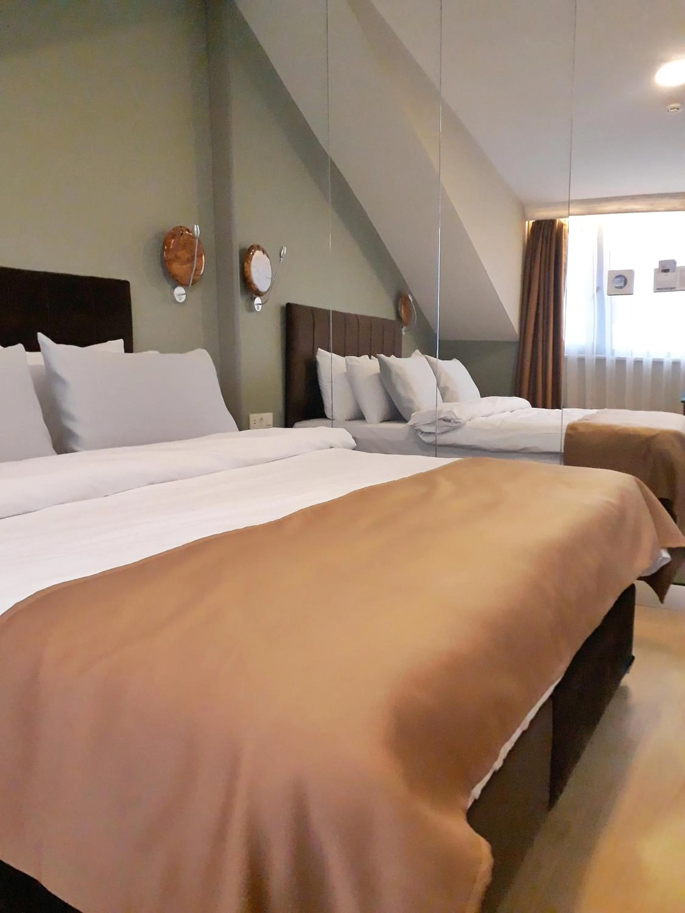 Bed in Jakaranda Hotel