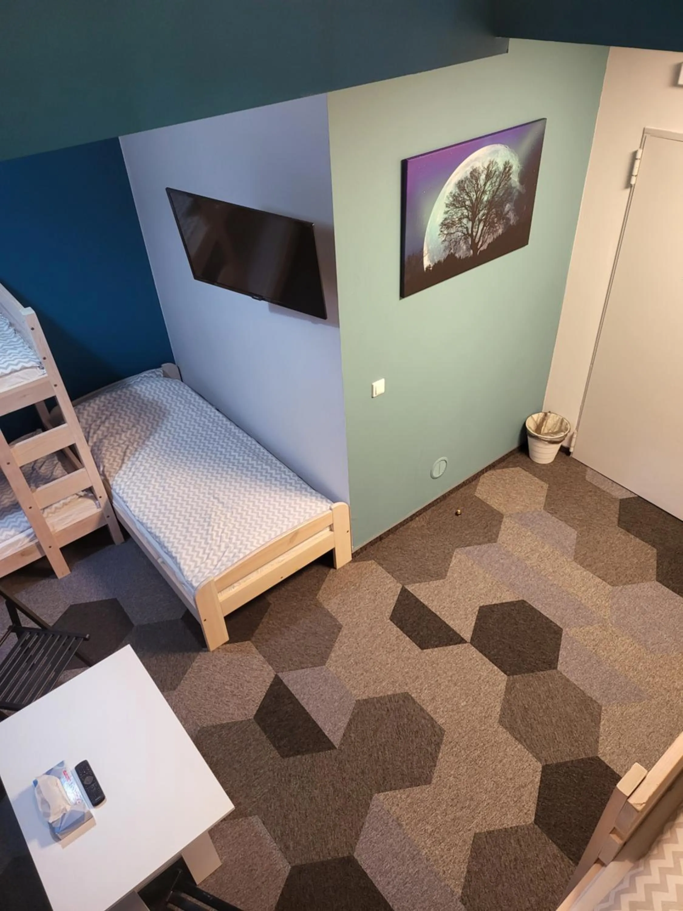 Seating area, Bed in Moon Hostel Poznań