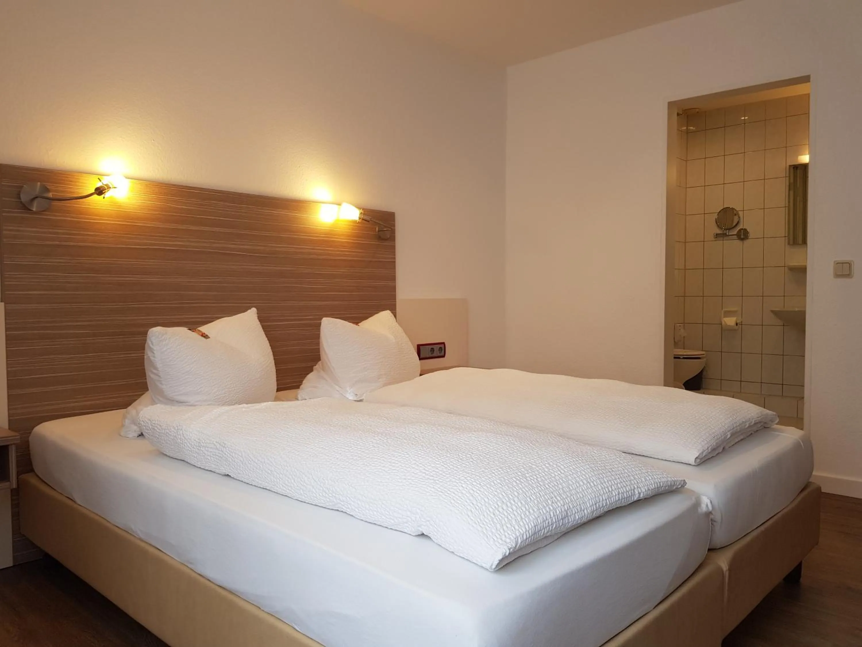 Photo of the whole room, Bed in Hotel Mühleneck