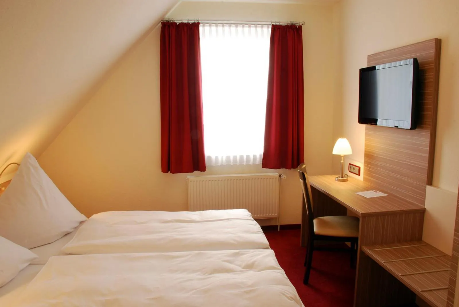 Photo of the whole room, Bed in Hotel Mühleneck