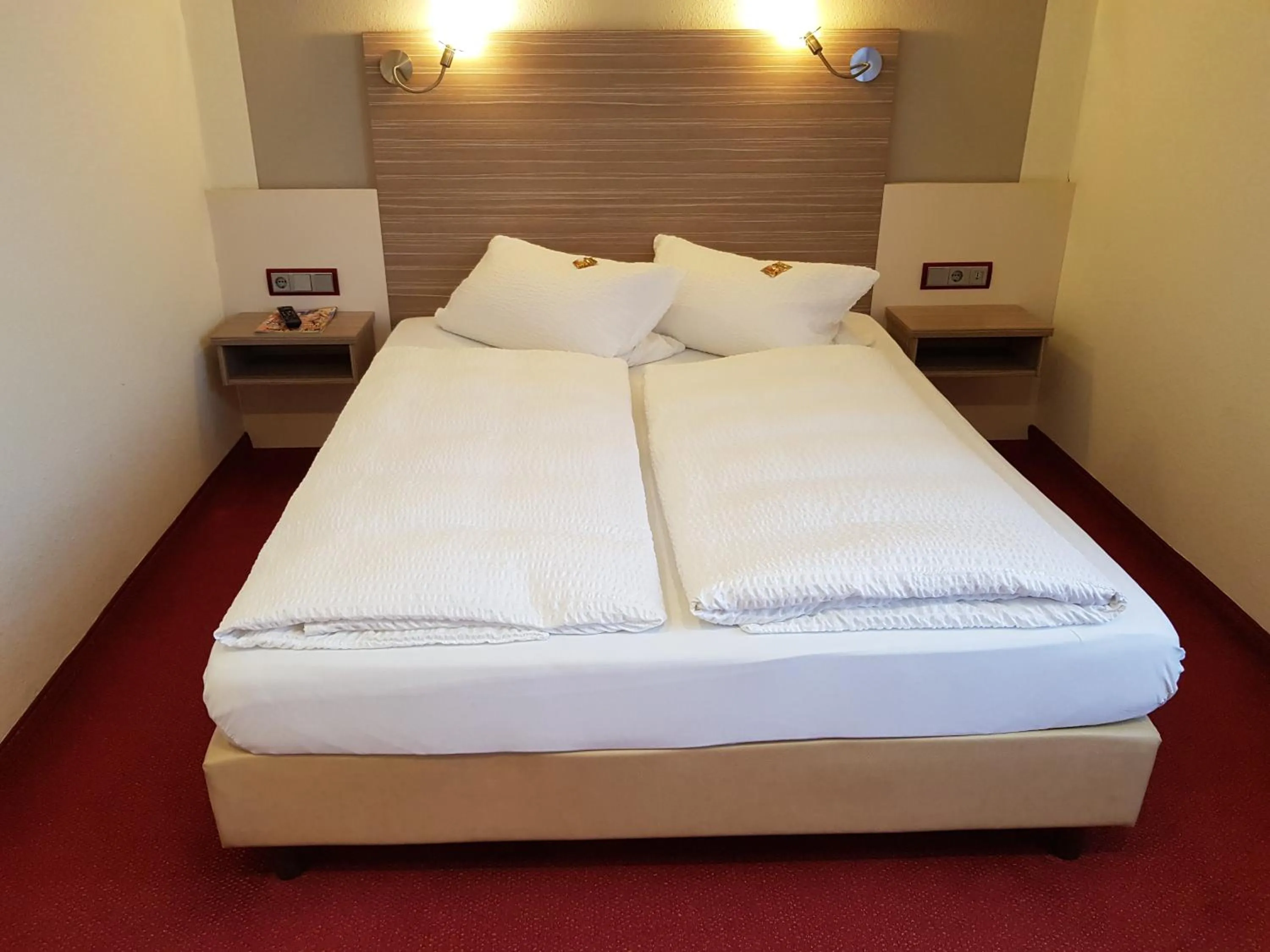 Bed in Hotel Mühleneck