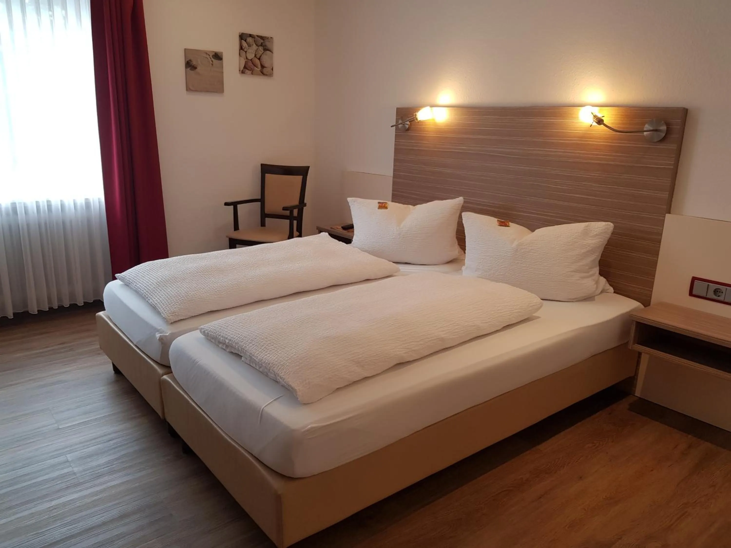Photo of the whole room, Bed in Hotel Mühleneck