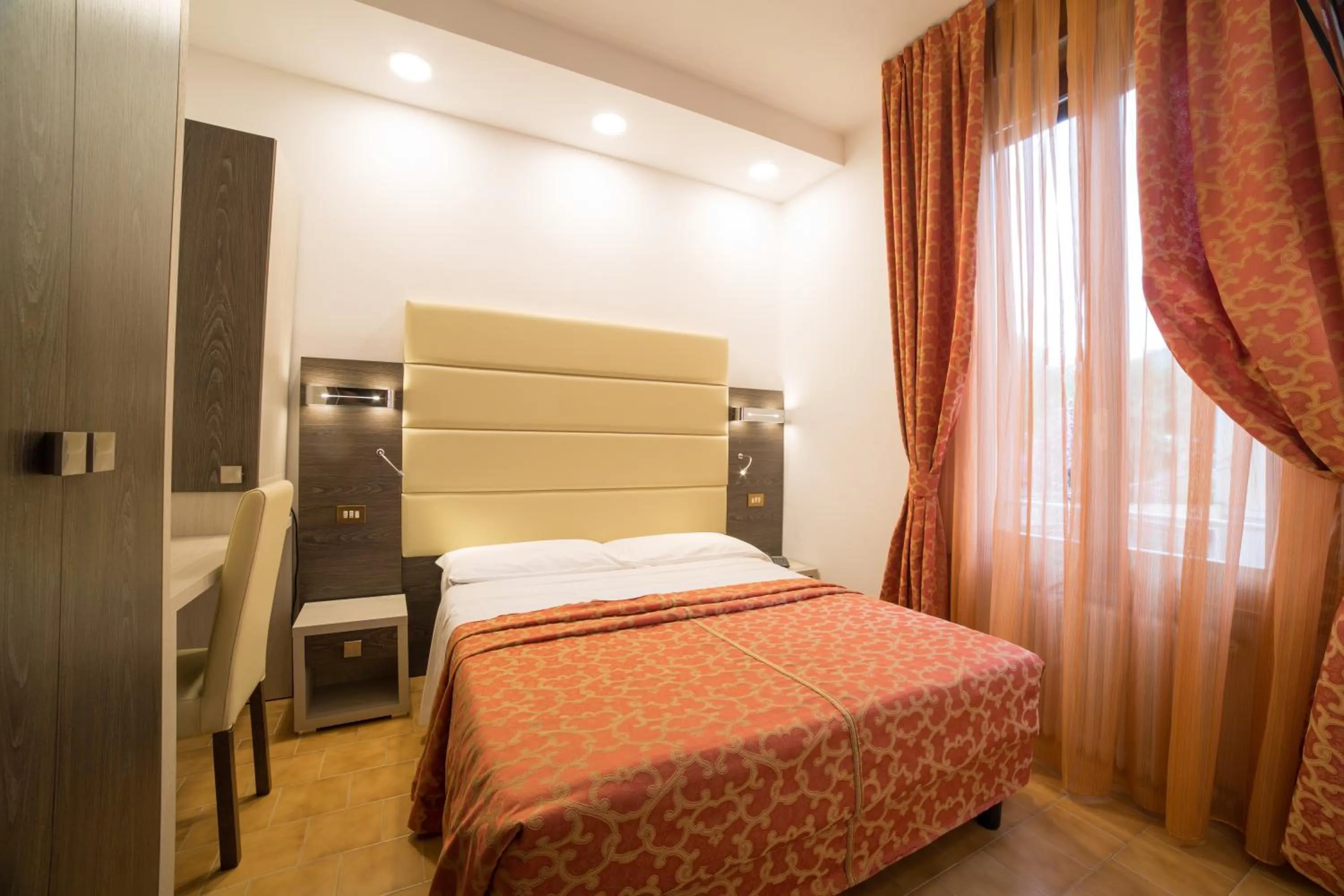 Bed in Hotel Carancini