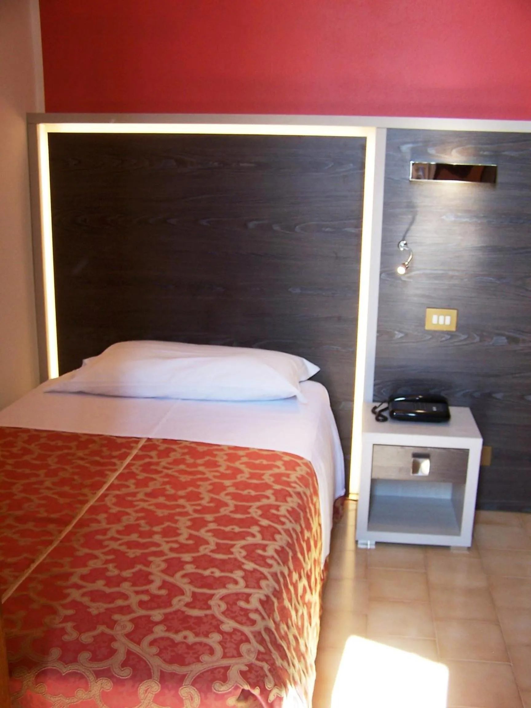 Bed in Hotel Carancini